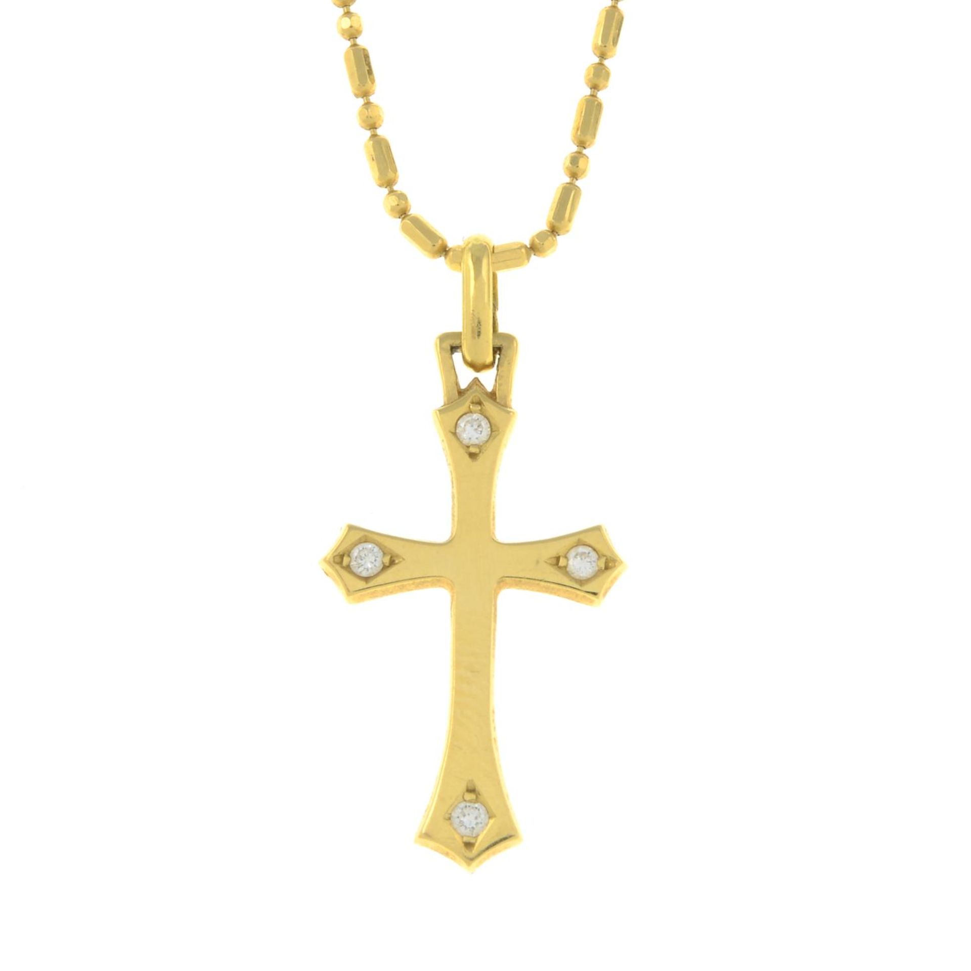 An 18ct gold diamond cross pendant, with 18ct gold chain.