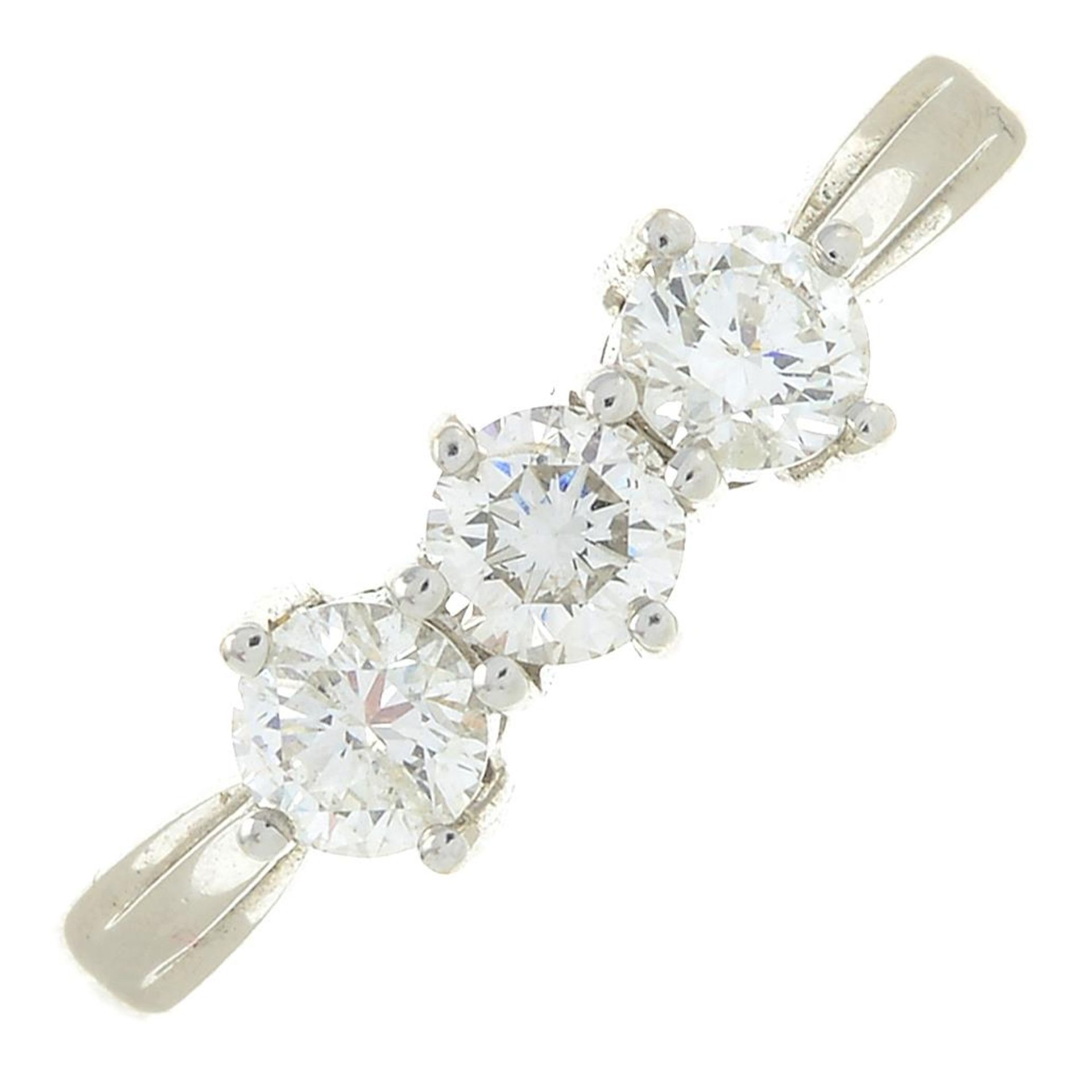 An 18ct gold brilliant-cut diamond three-stone ring.Total diamond weight 0.75ct,