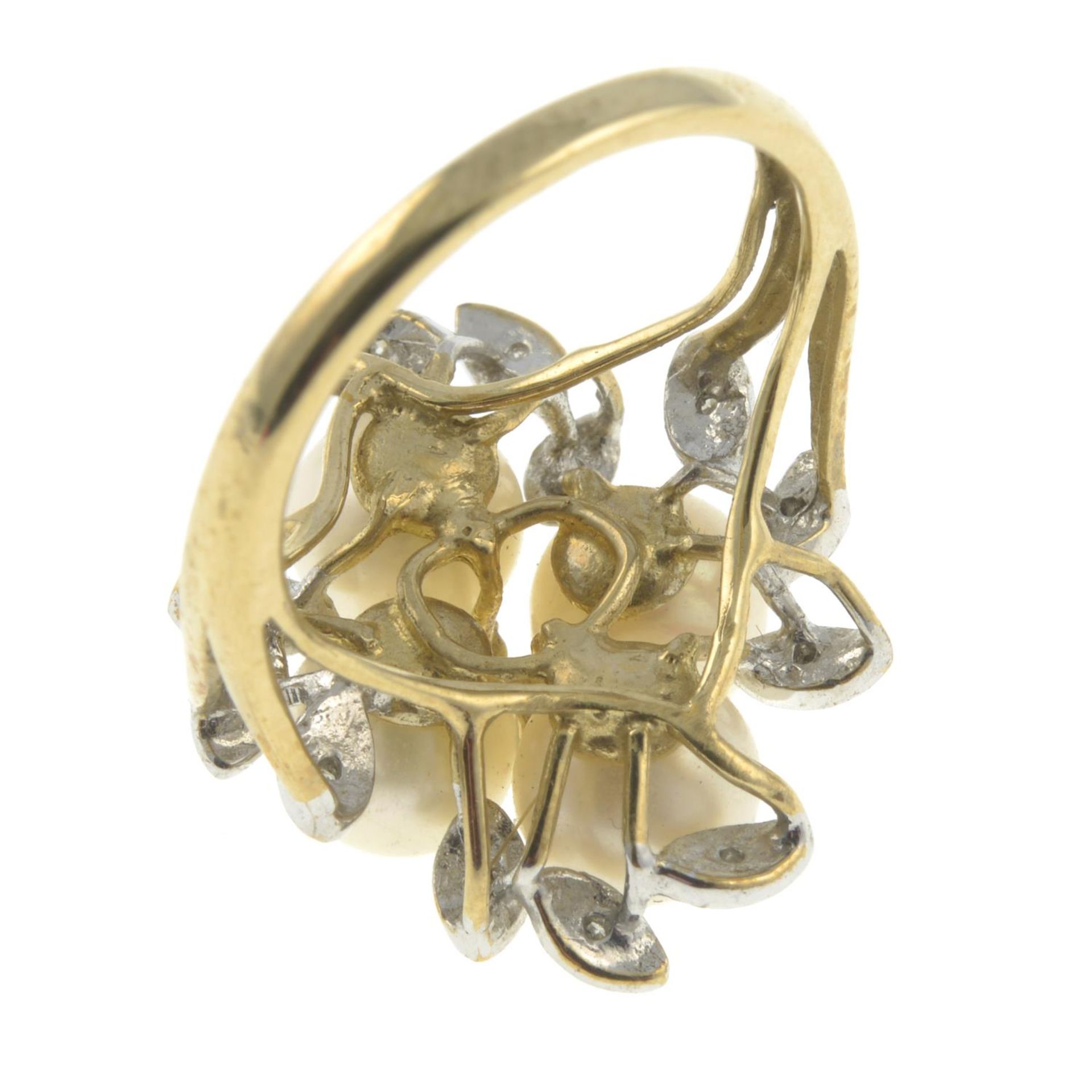 A 9ct gold cultured pearl and diamond floral dress ring.Hallmarks for 9ct gold. - Image 2 of 3