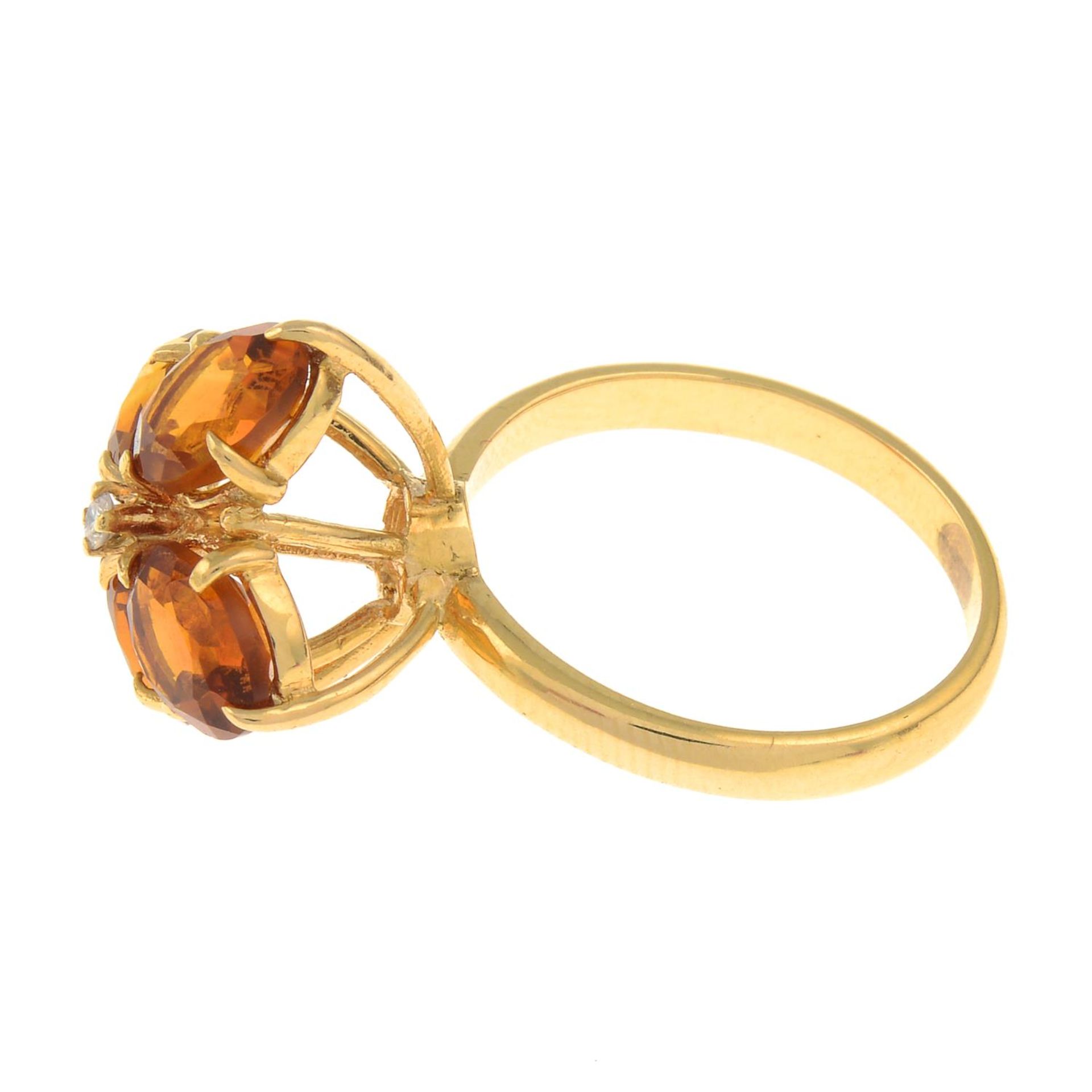 A citrine and diamond floral cluster ring.Stamped K18. - Image 2 of 3