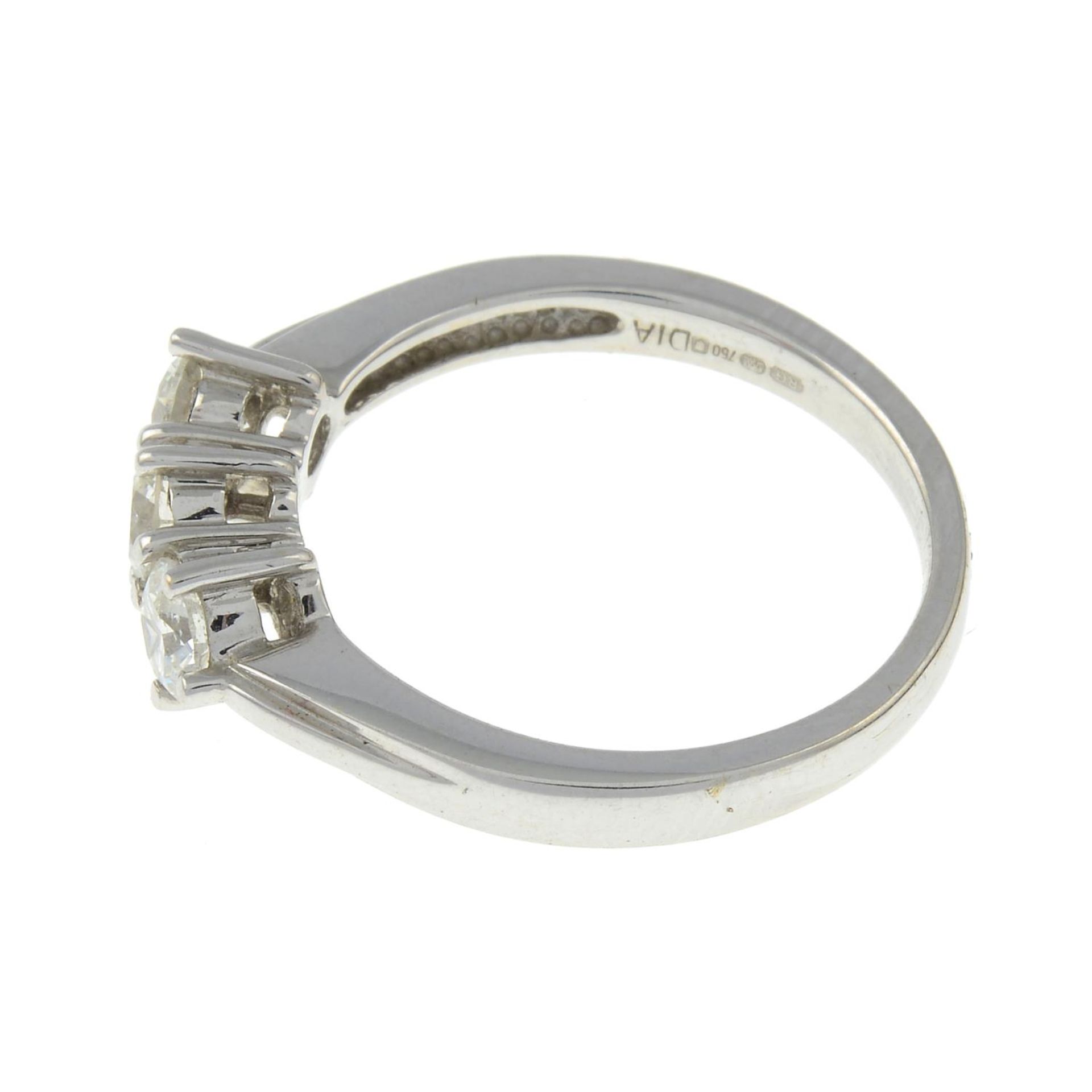 An 18ct gold brilliant-cut diamond three-stone ring.Total diamond weight 0.75ct, - Image 2 of 3