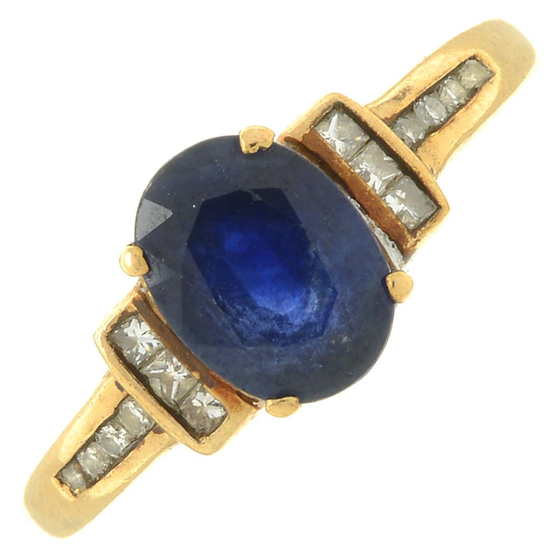 A 9ct gold sapphire and diamond ring.Estimated total diamond weight 0.20ct.Hallmarks for