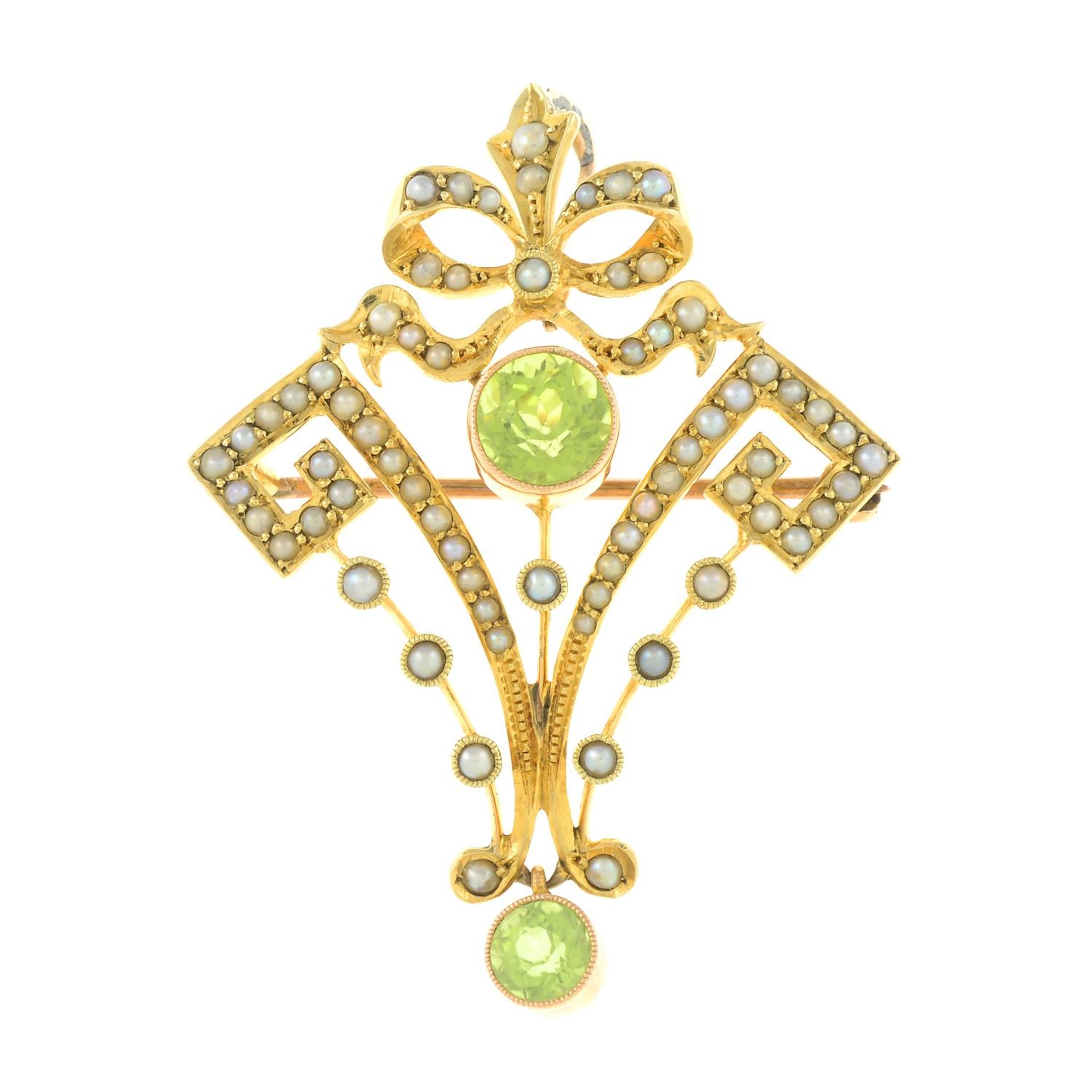 An early 20th century 15ct gold peridot and split pearl brooch.