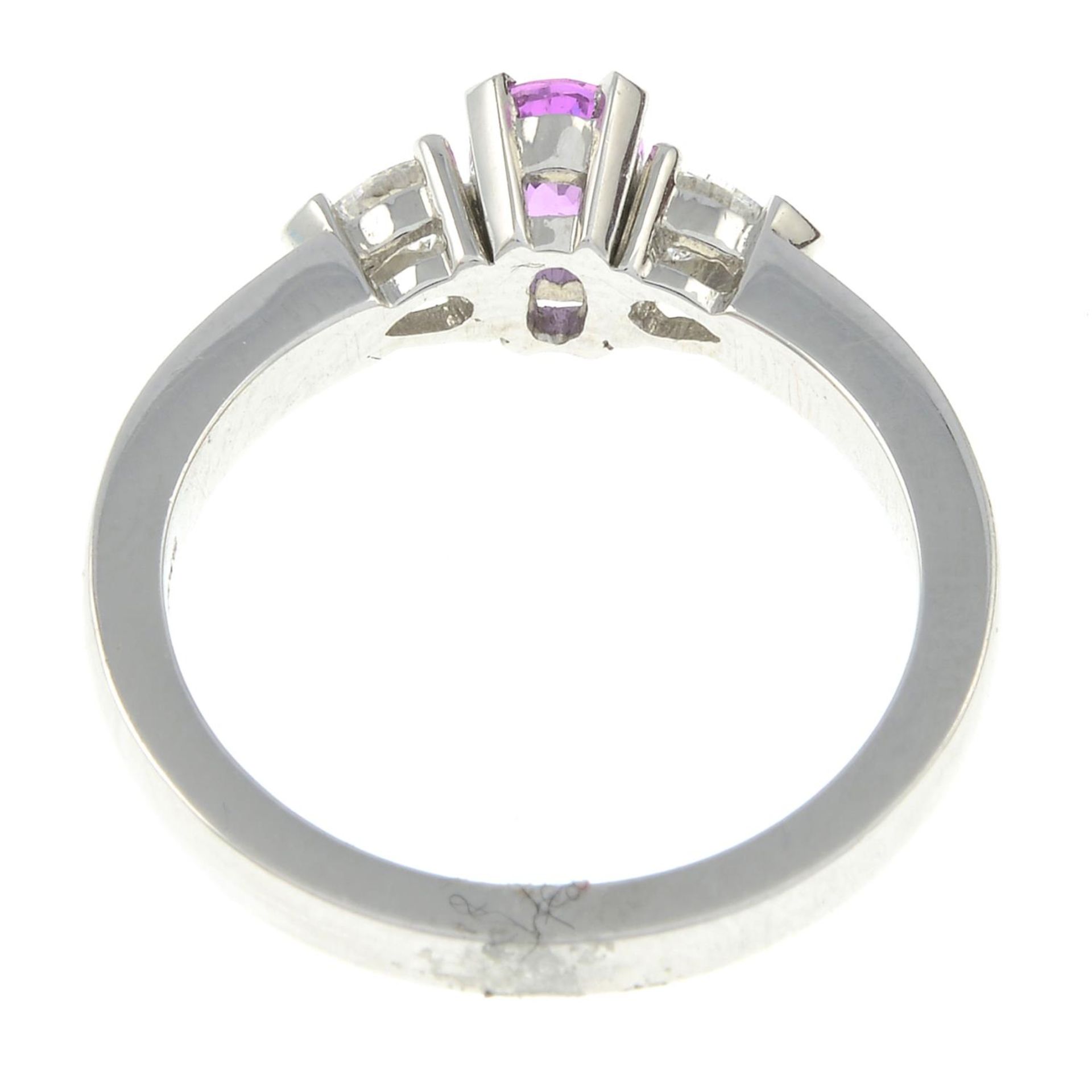 An 18ct gold pink sapphire and diamond three-stone ring.Estimated total diamond weight 0.25ct, - Image 3 of 3
