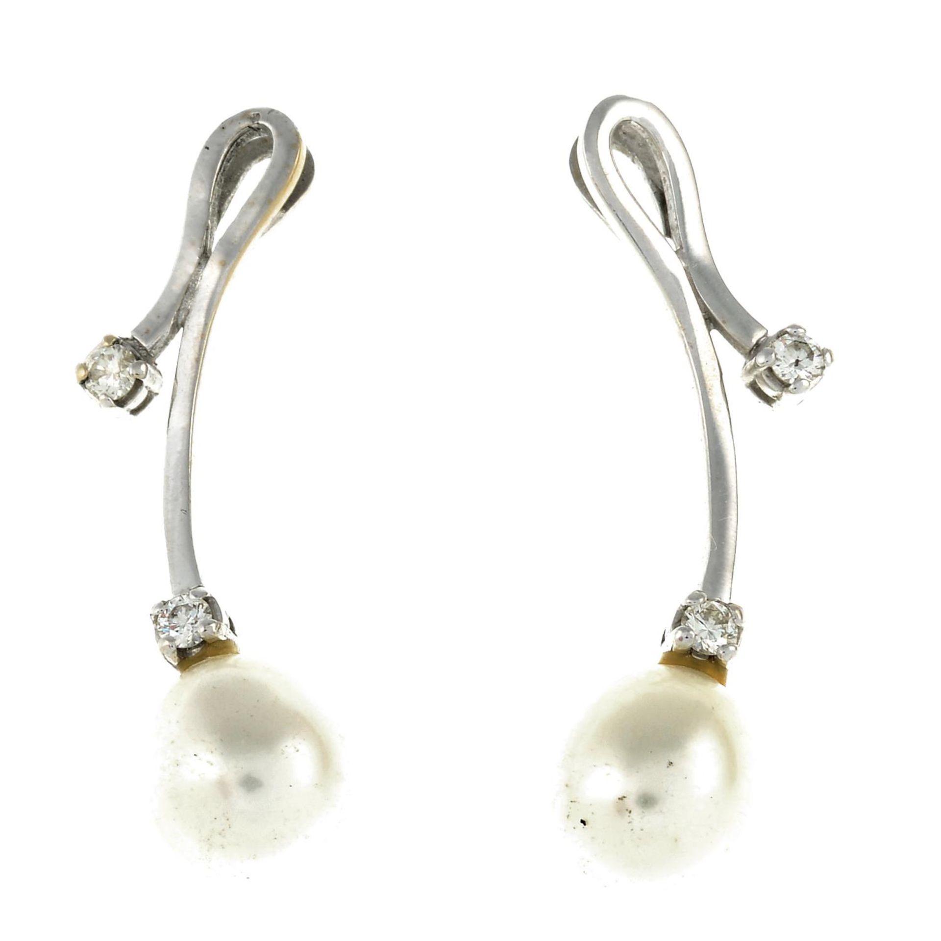 A pair of cultured pearl and diamond earrings,