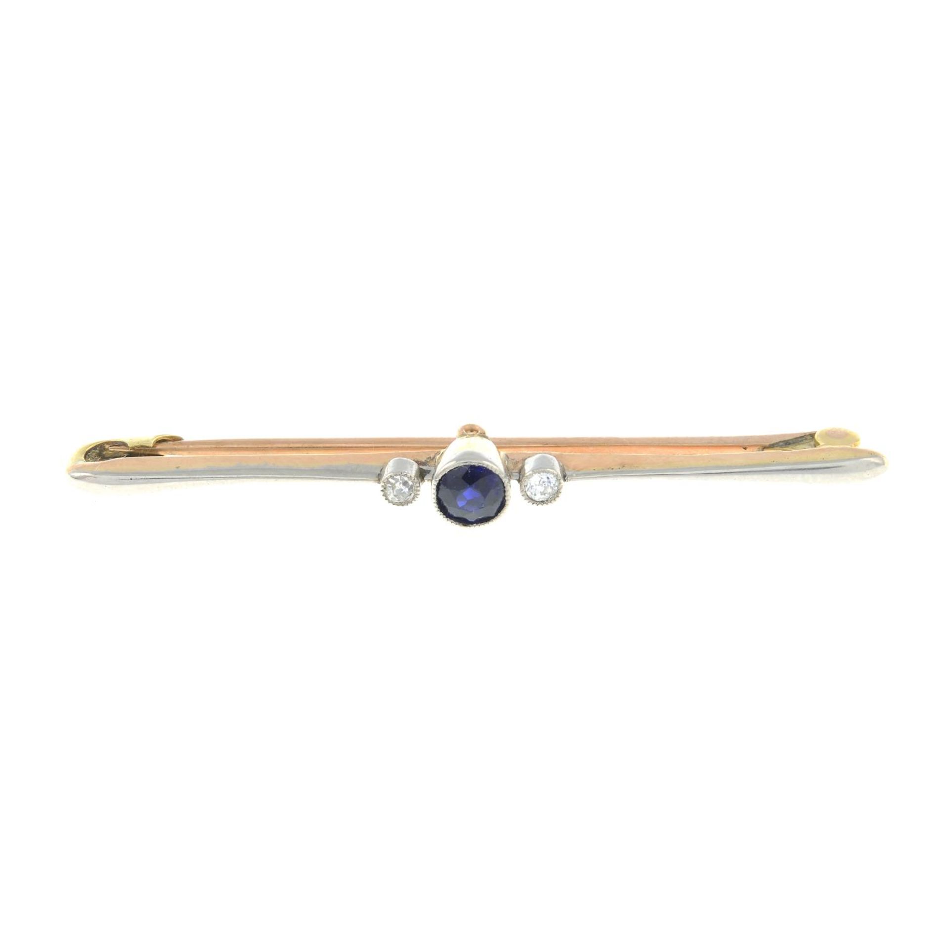 An early 20th century sapphire and single-cut diamond bar brooch.Estimated total diamond weight