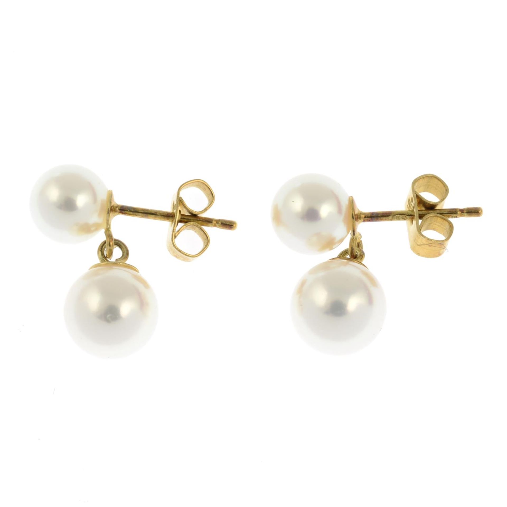 A pair of 18ct gold cultured pearl stud earrings with a suspended cultured pearl.Hallmarks for - Image 2 of 2