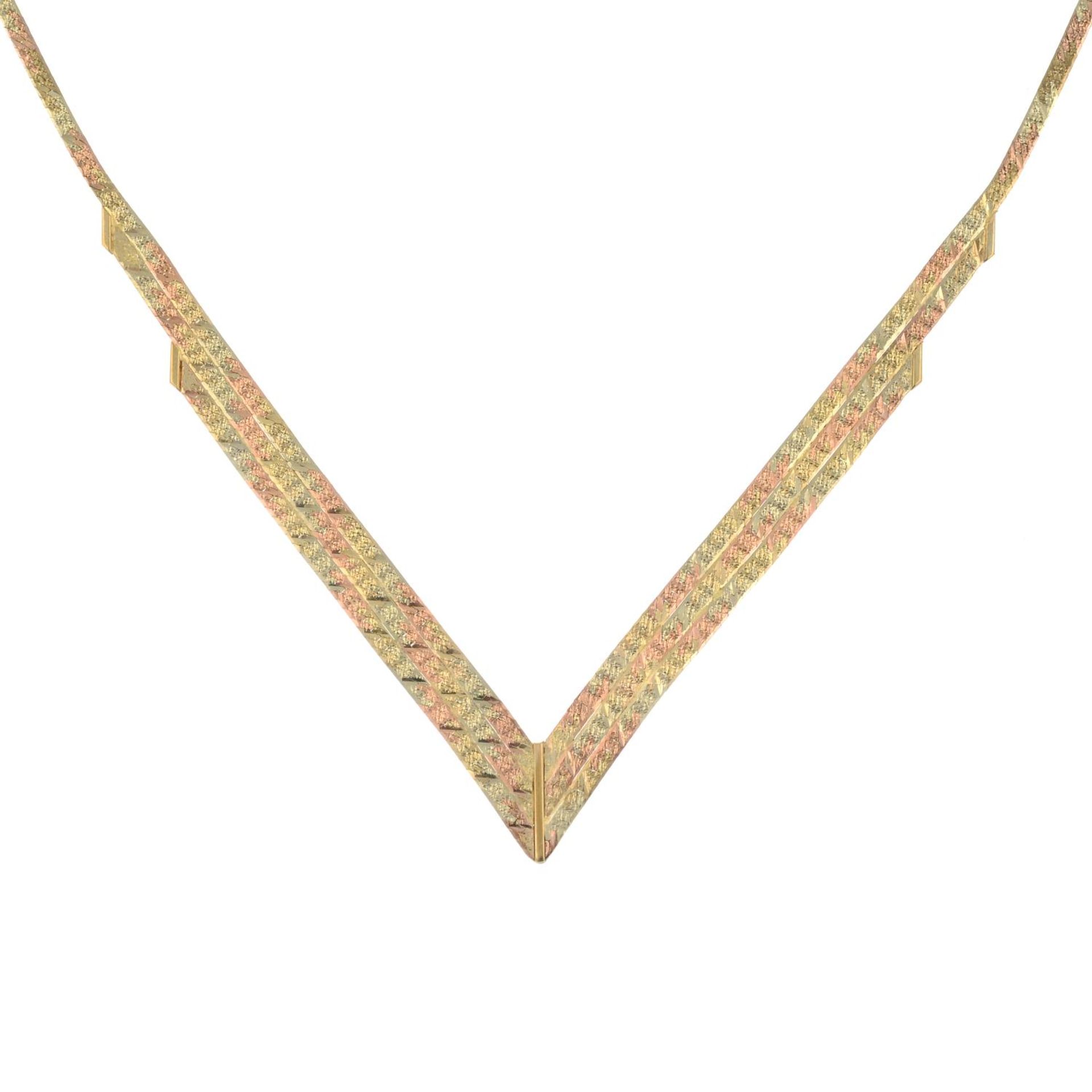 A 9ct gold tri-coloured necklace.Hallmarks for Birmingham.Length 44cms.