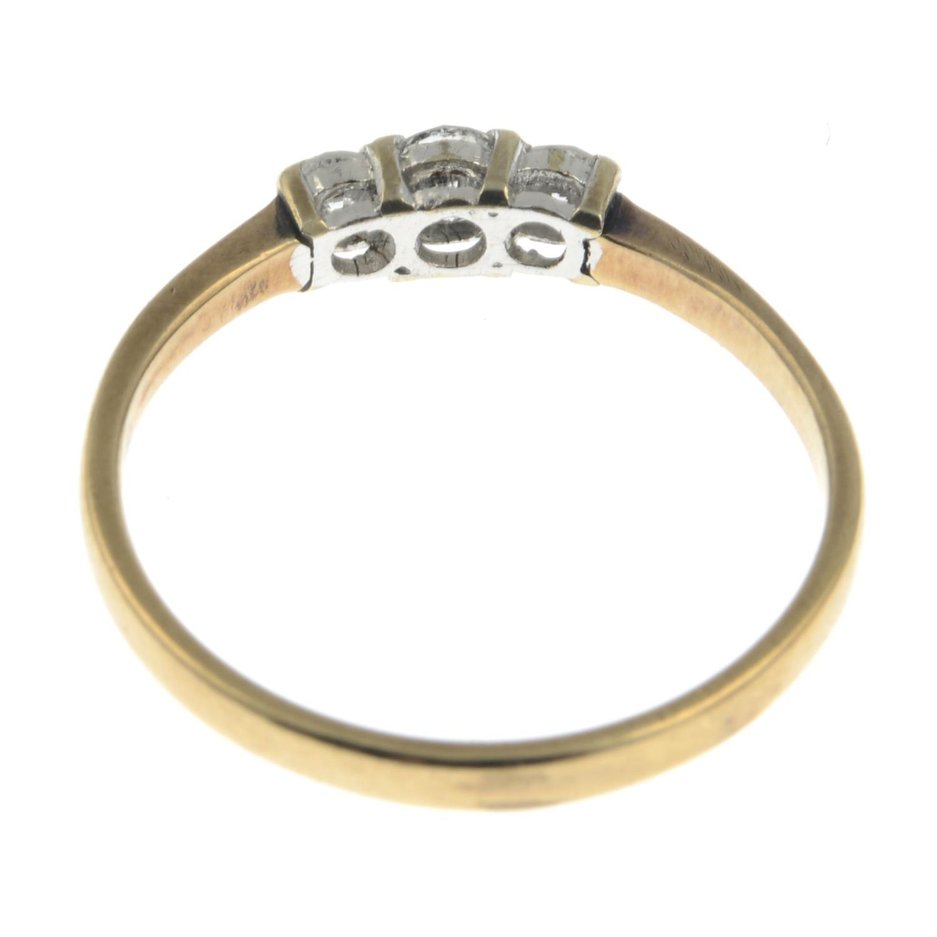 A 9ct gold brilliant-cut diamond three-stone ring.Estimated total diamond weight 0.29cts.Hallmarks - Bild 3 aus 3