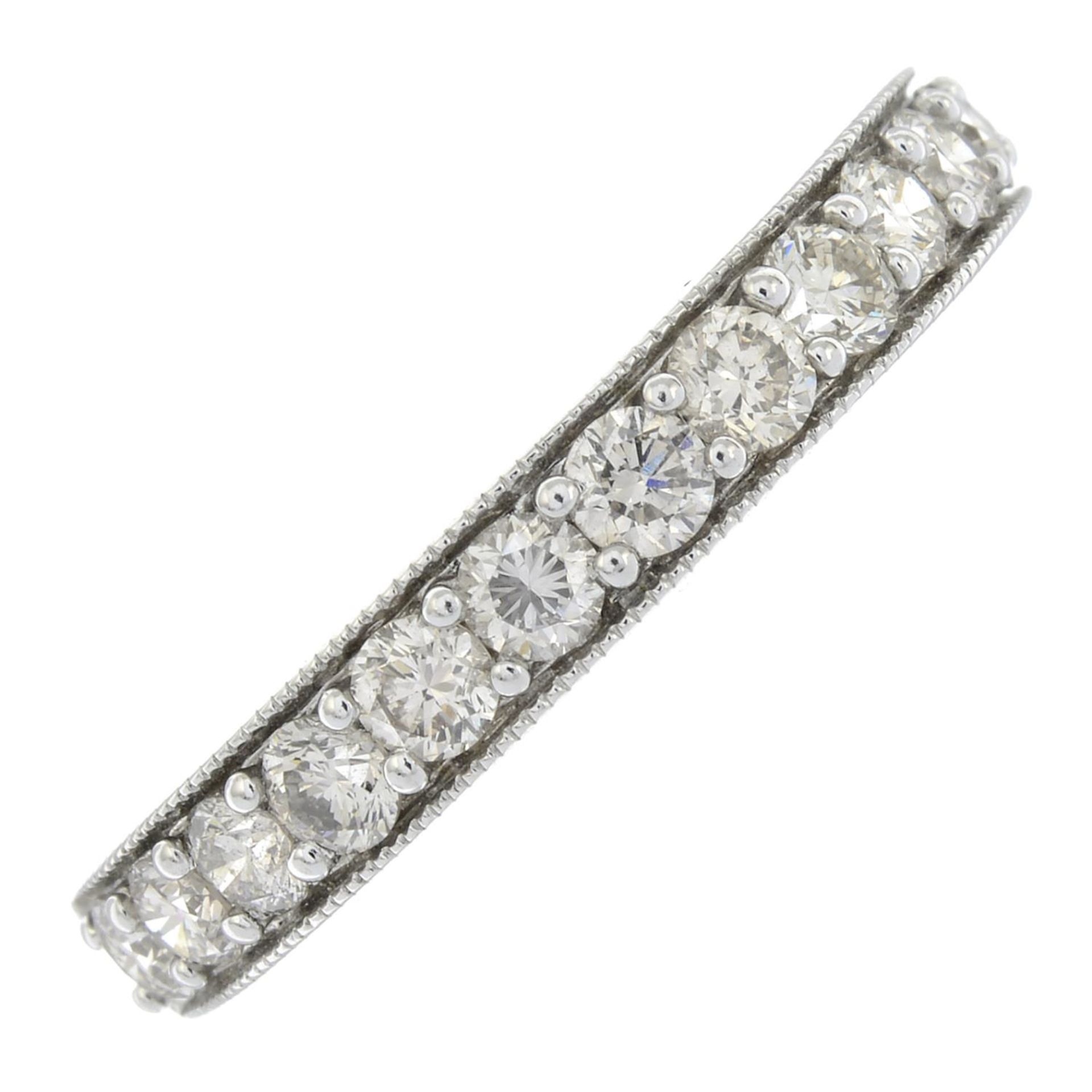 A 9ct gold brilliant-cut diamond half eternity ring.Total diamond weight 0.75ct,