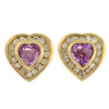 A pair of 9ct gold pink sapphire and diamond heart stud earrings.Estimated total diamond weight