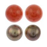 A pair of coral stud earrings and two pairs of brown cultured pearl stud earrings.Stamped