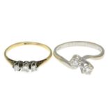 Two diamond rings.One with hallmarks for 18ct gold.