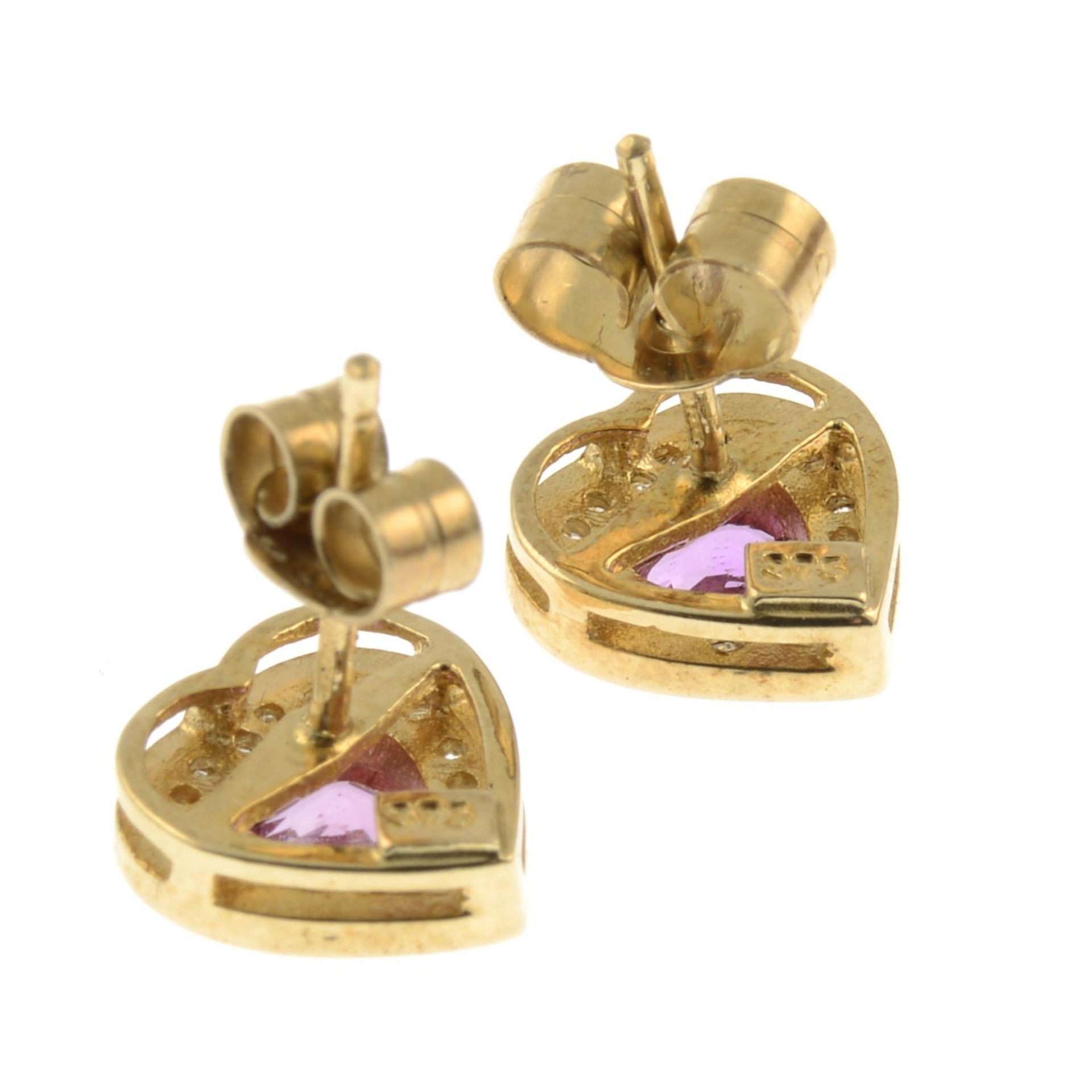 A pair of 9ct gold pink sapphire and diamond heart stud earrings.Estimated total diamond weight - Image 2 of 2