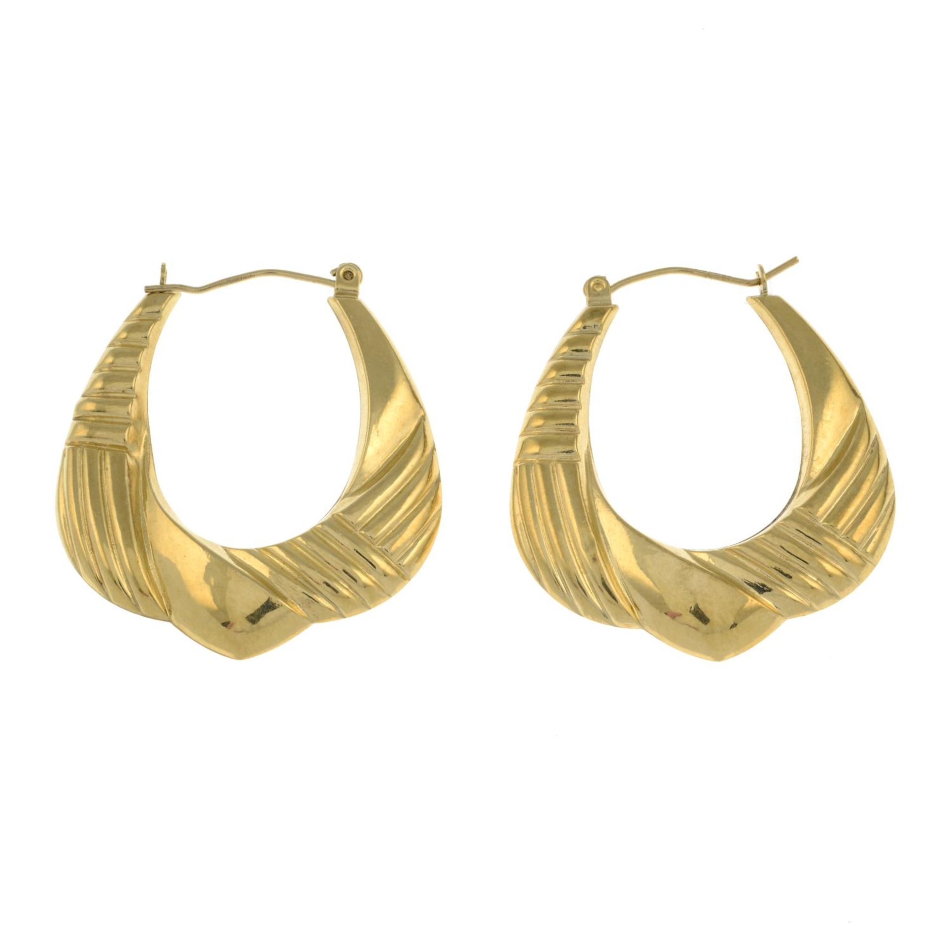 A pair of 9ct gold hoop earrings.Hallmarks for Birmingham.Length 3.3cms.