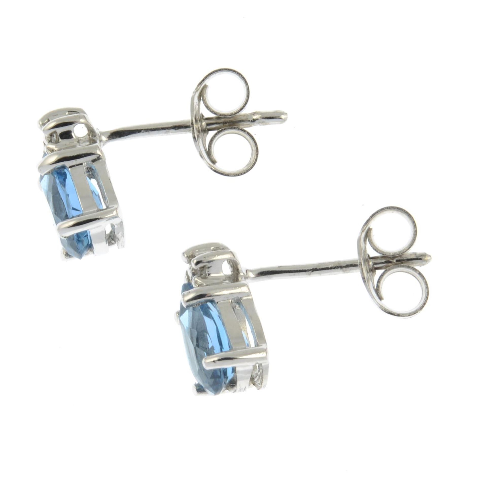 A pair of blue topaz and diamond stud earrings.Stamped 375.Length 0.8cms. - Image 2 of 2