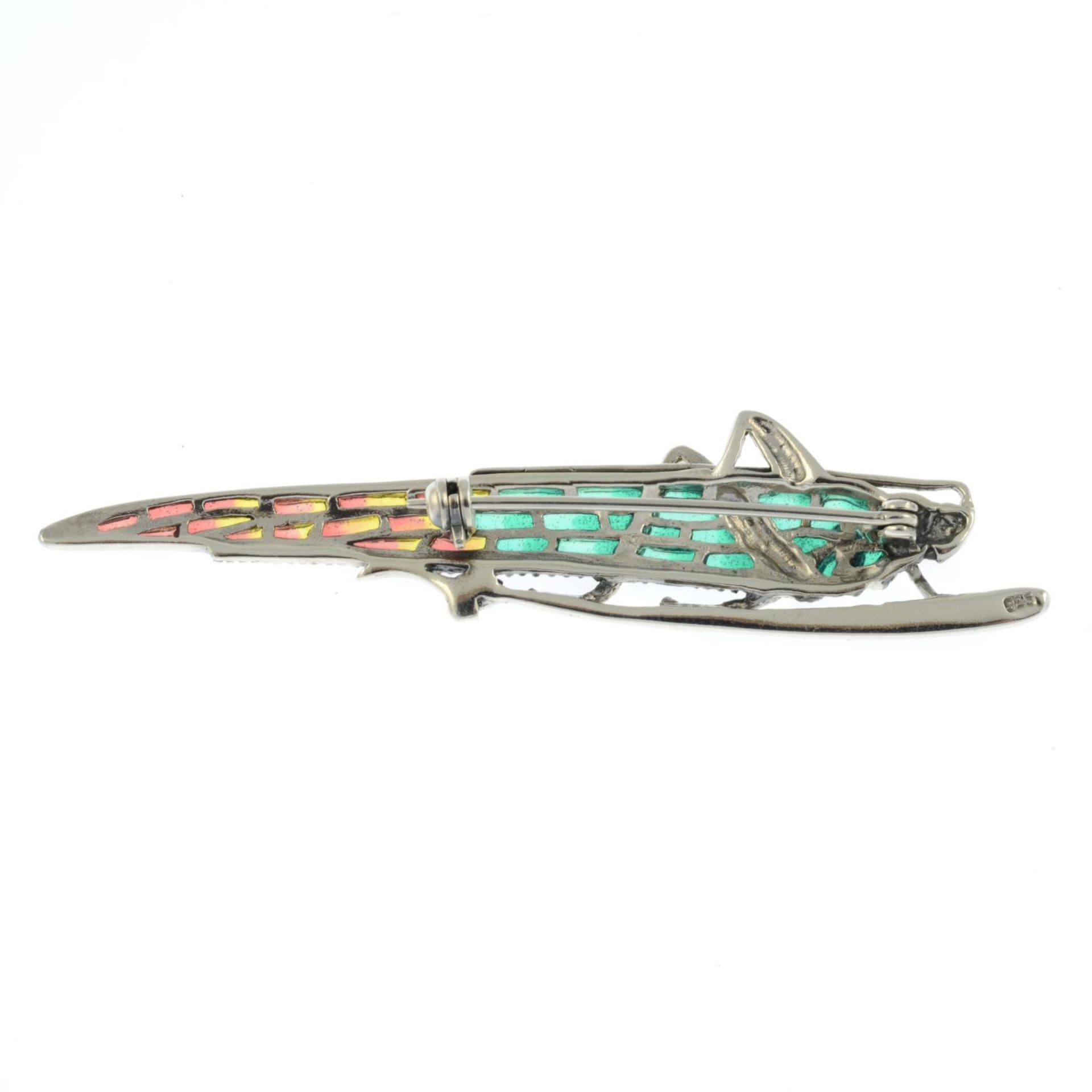 A marcasite and ruby plique-a-jour brooch of a grasshopper.Stamped 925.Length of brooch 7.2cms. - Bild 2 aus 2