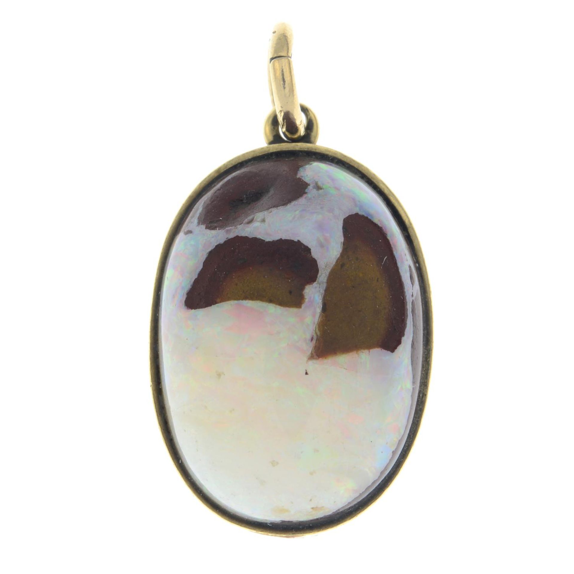 A boulder opal pendant.Length 2.5cms.