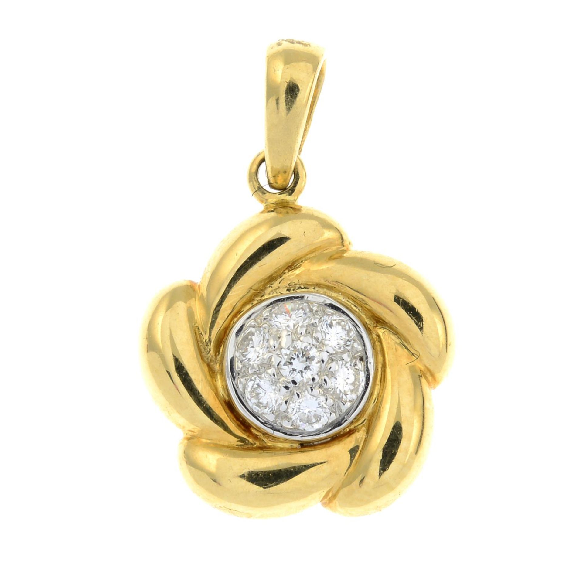 An 18ct gold brilliant-cut diamond cluster pendant.Estimated total diamond weight 0.14cts.Hallmarks