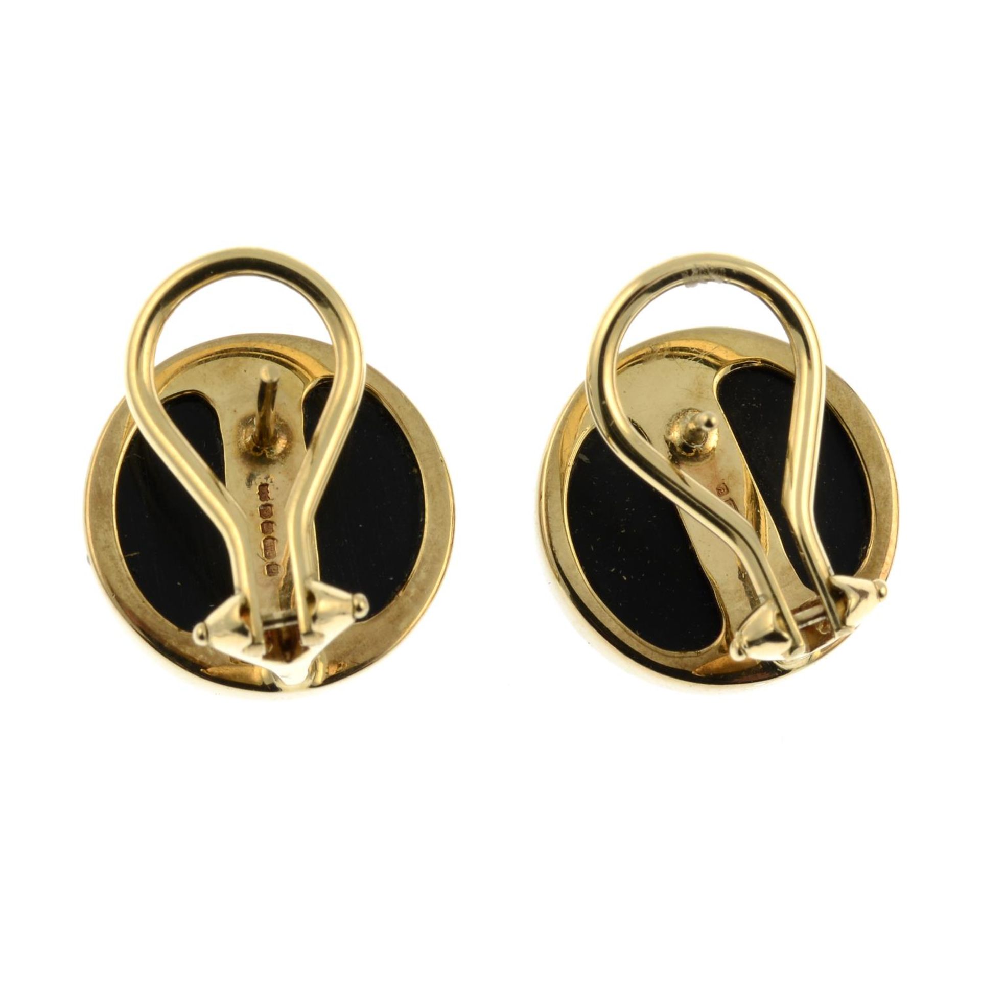 A pair of 9ct gold onyx cabochon earrings.Hallmarks for Sheffield.Lengths 1.6cms. - Image 2 of 2