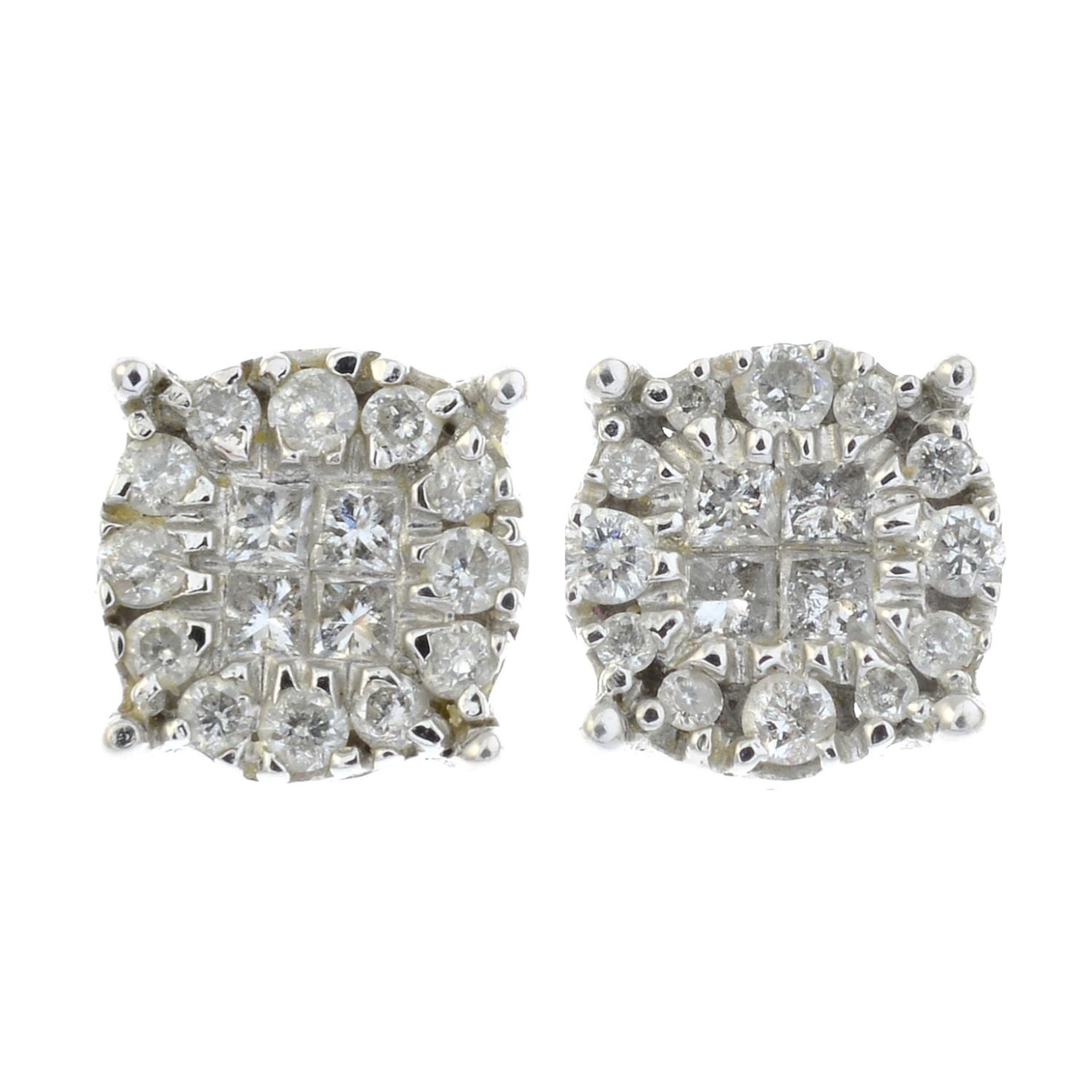 A pair of 14ct gold diamond cluster,