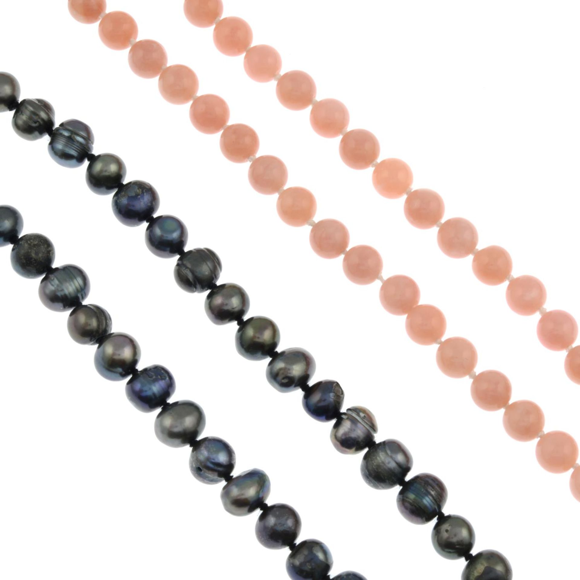 Three cultured pearl necklaces and pink opal bead necklace.One clasp stamped 14k.