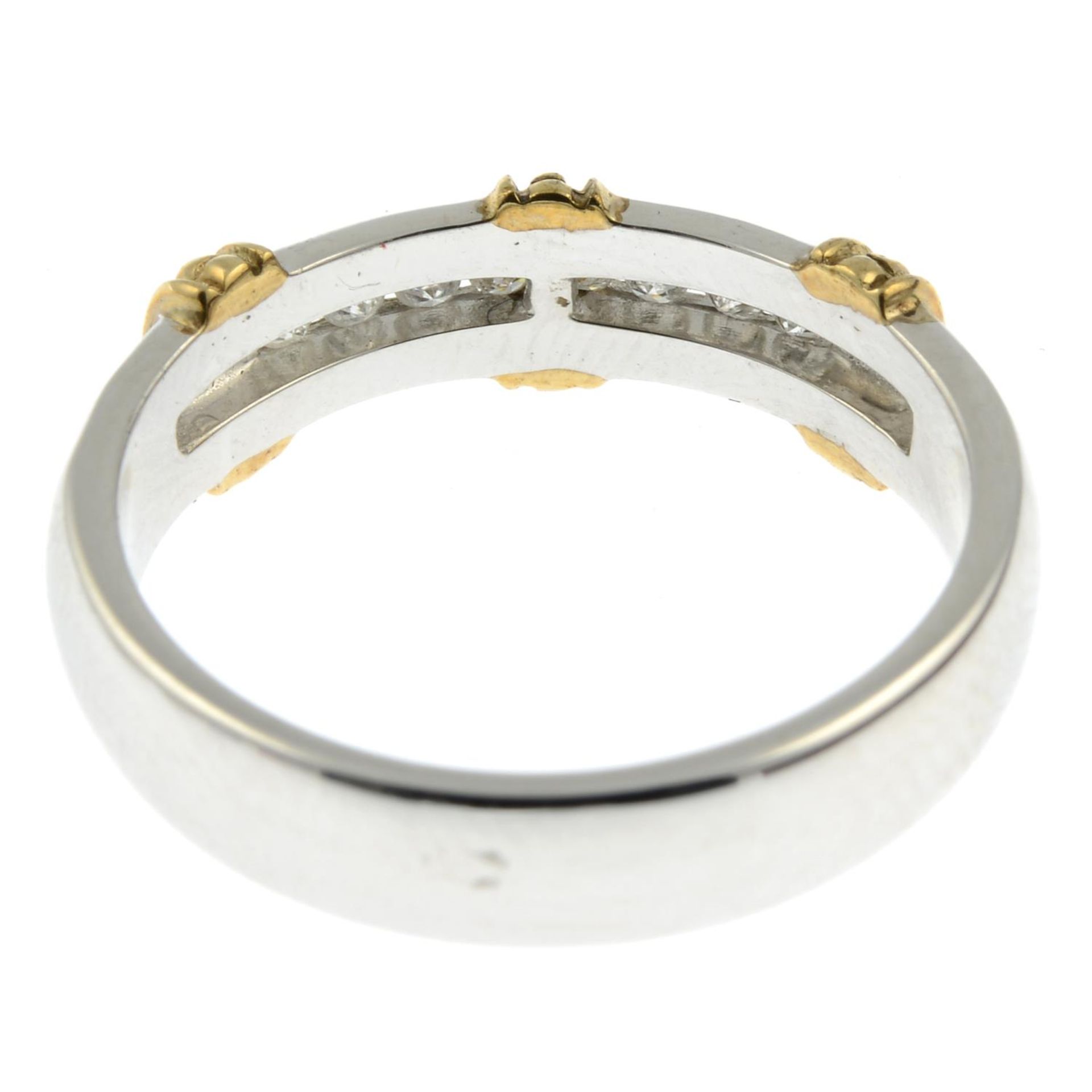 A 9ct gold bi-colour diamond band ring.Total diamond weight stamped to band 0.15cts.Hallmarks for - Image 2 of 2