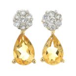 A pair of 9ct gold citrine and diamond drop stud earrings.Estimated total diamond weight