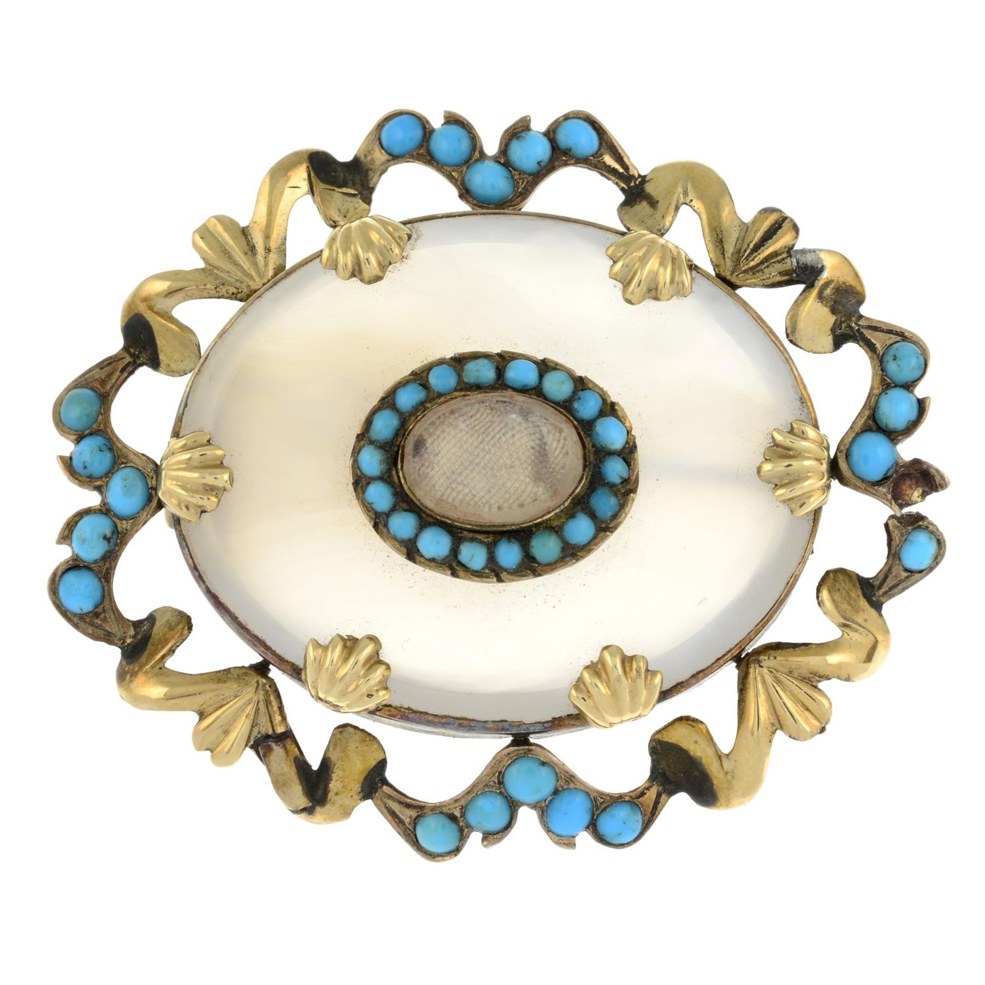A late 19th century chalcedony and turquoise mourning brooch.