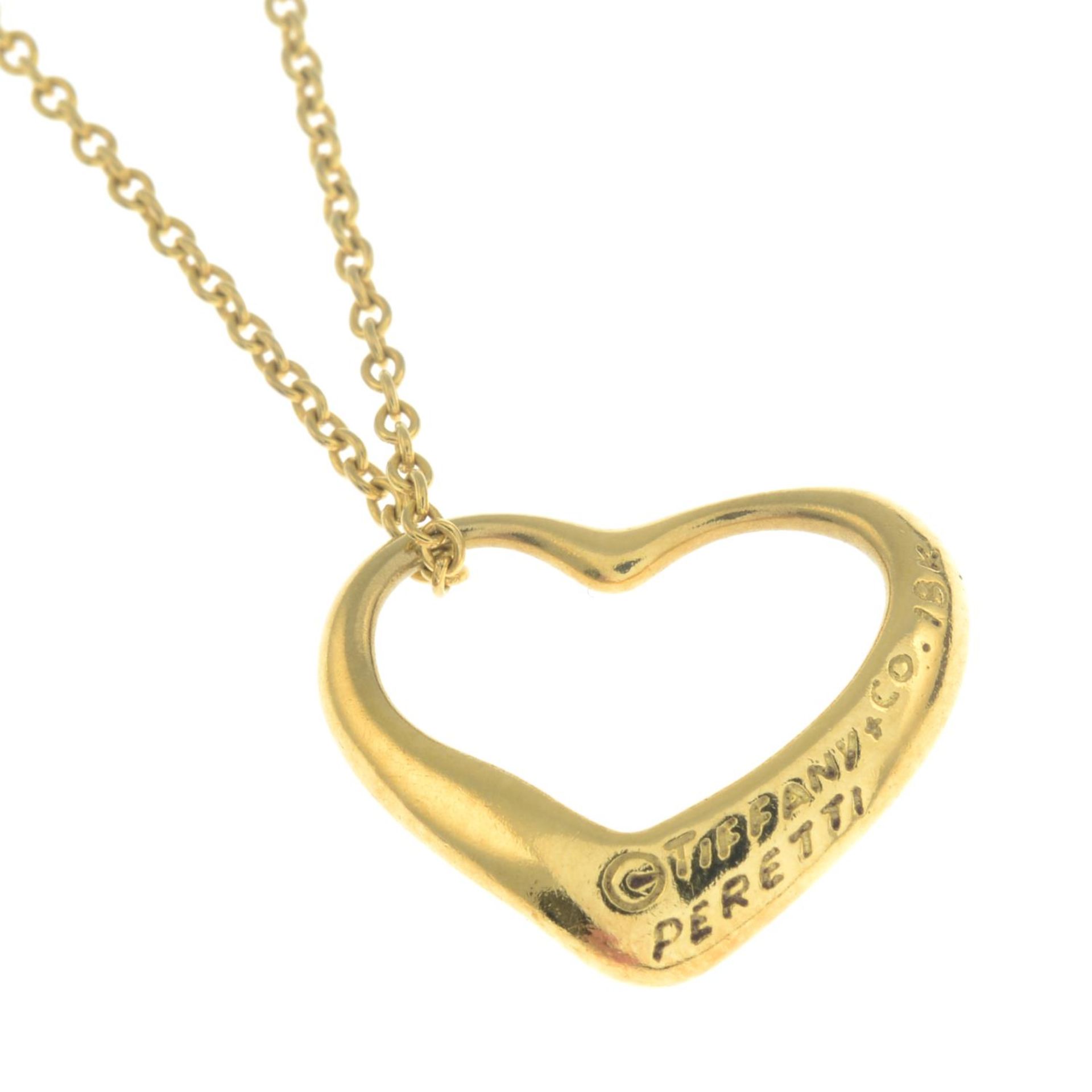 An 'Open Heart' pendant with chain, by Elsa Peretti for Tiffany & Co.Signed Tiffany & Co. - Image 2 of 3