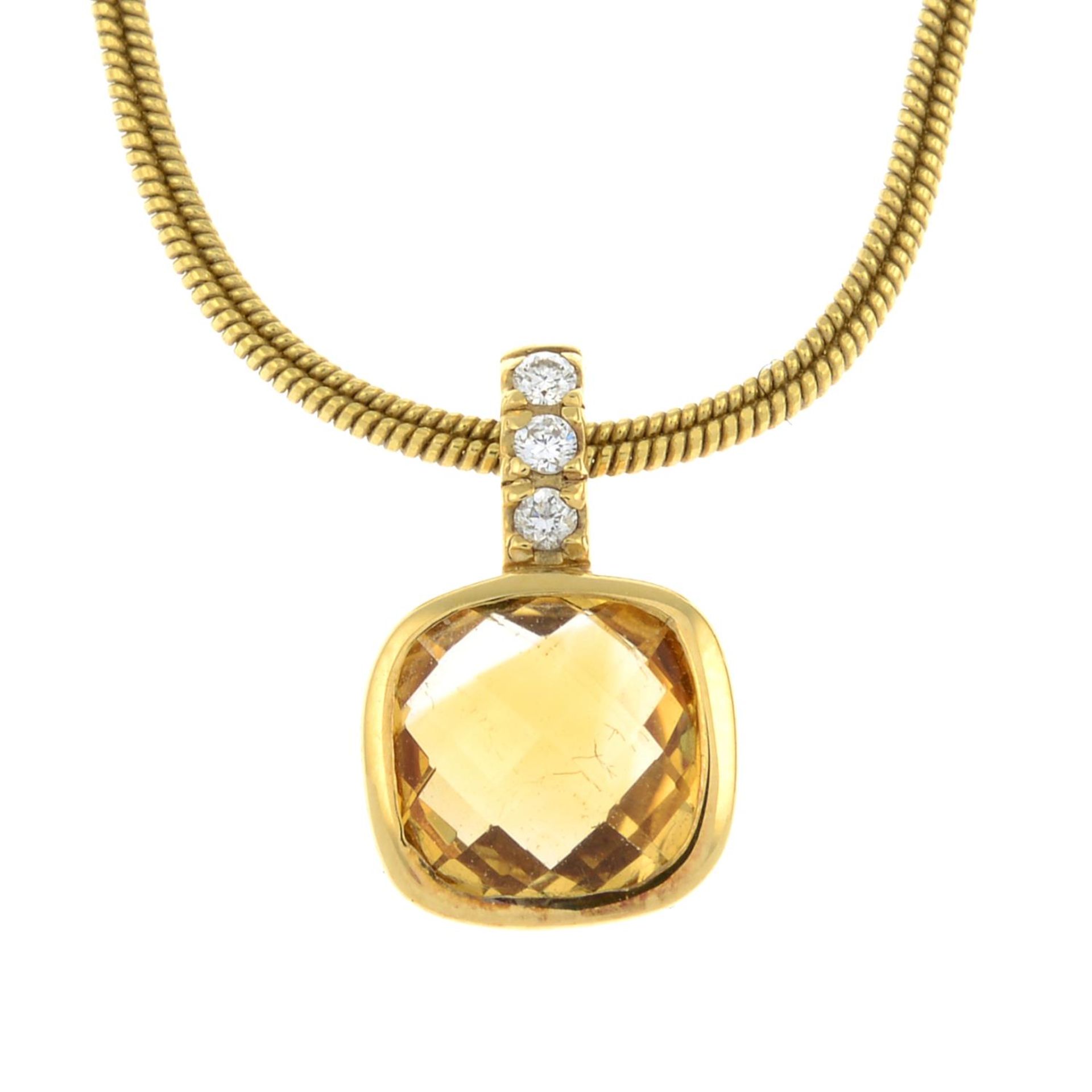 An 18ct gold citrine and diamond pendant with chain.Total diamond weight 0.03cts stamped to