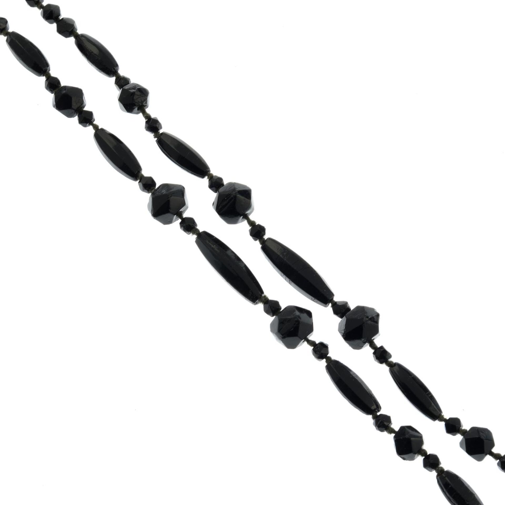 A selection of black glass bead necklaces,