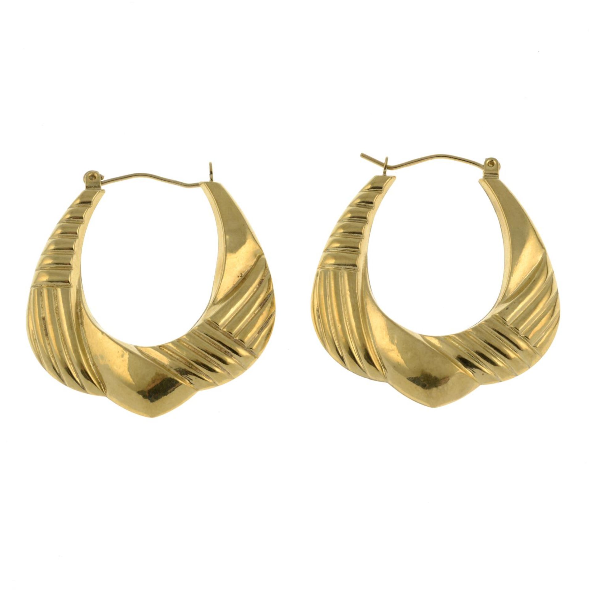 A pair of 9ct gold hoop earrings.Hallmarks for Birmingham.Length 3.3cms. - Image 2 of 2