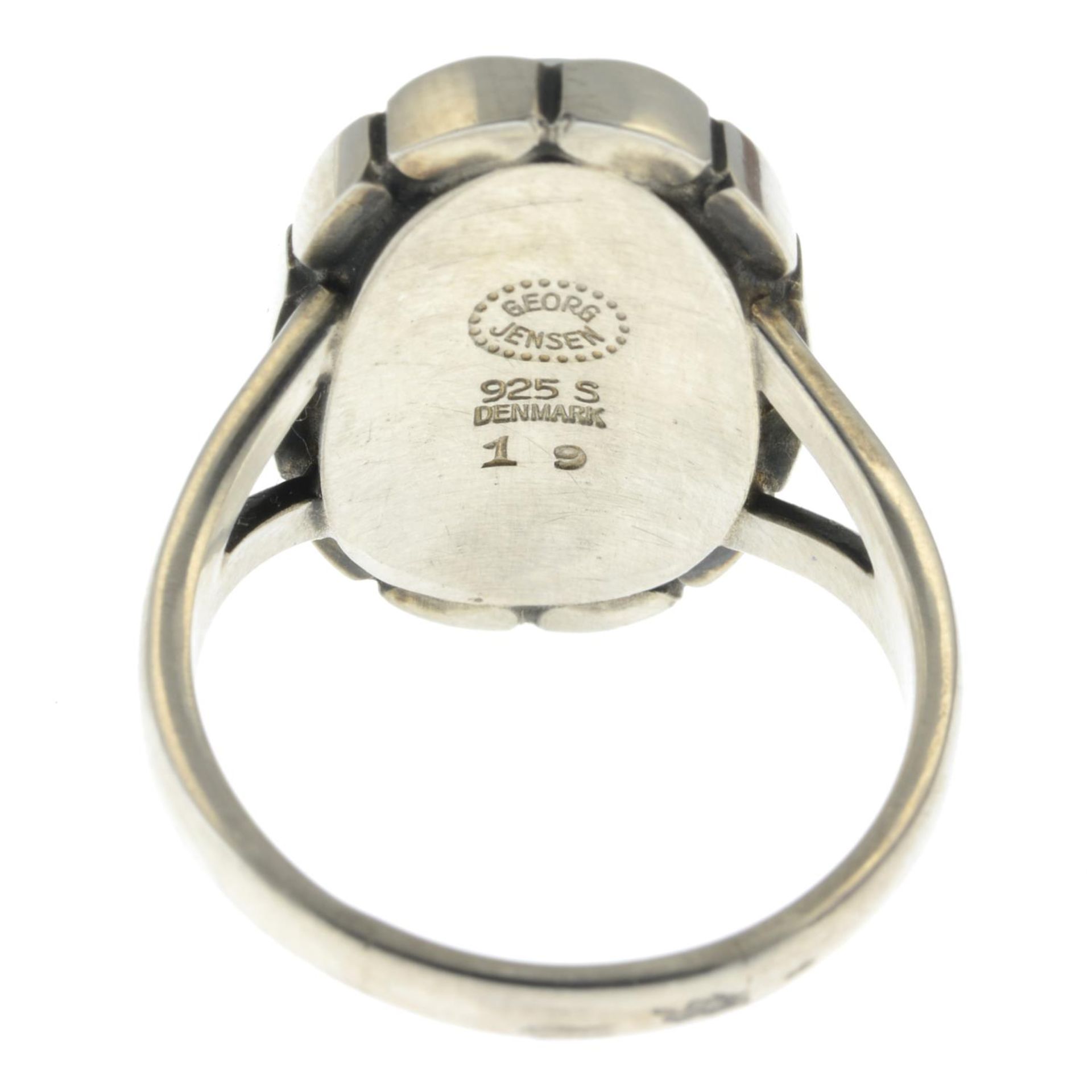 An oval ring with a beaded surround, by Georg Jensen.Signed Georg Jensen. - Image 3 of 3