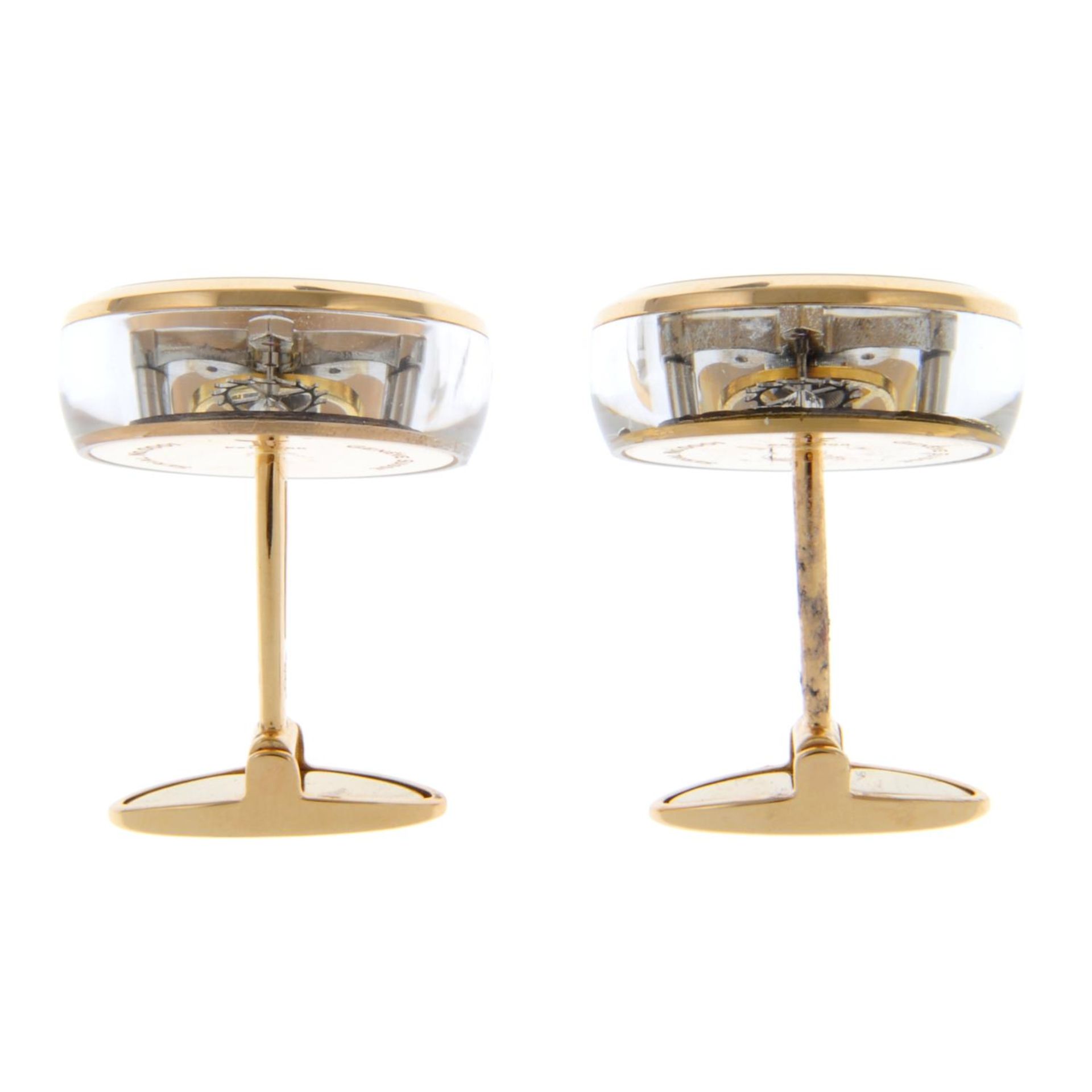 A pair of 18ct yellow gold, sapphire watch movement cufflinks. - Image 5 of 6