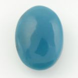 A carved opal and a turquoise cabochon,