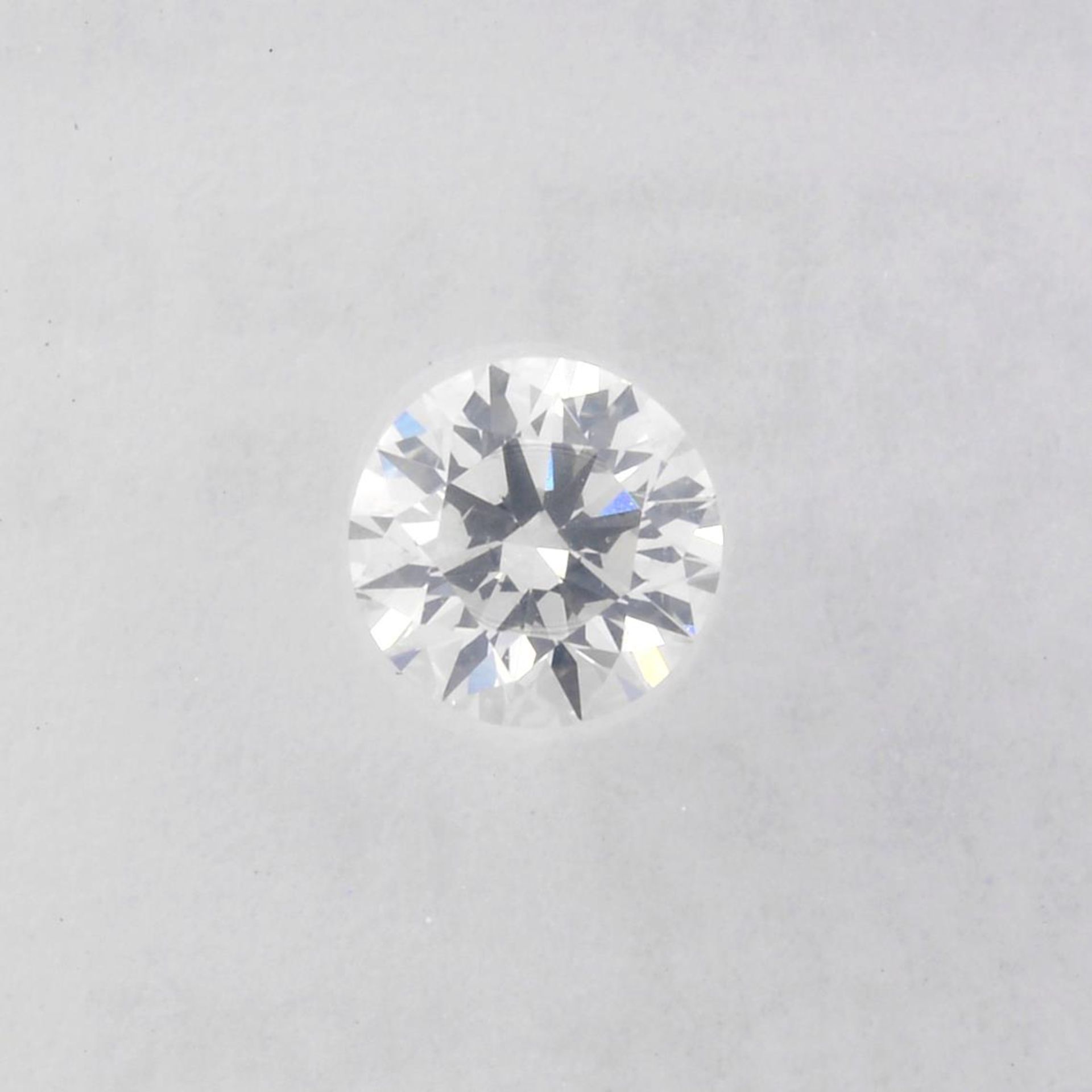 A brilliant-cut diamond, weighing 0.22ct.