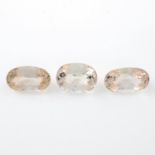 Three oval shape pink topazes,