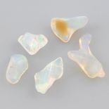 Ten vari-shape opals PLEASE NOTE THIS LOT WILL CARRY VAT AT 20% ON THE HAMMER PRICE.Due to