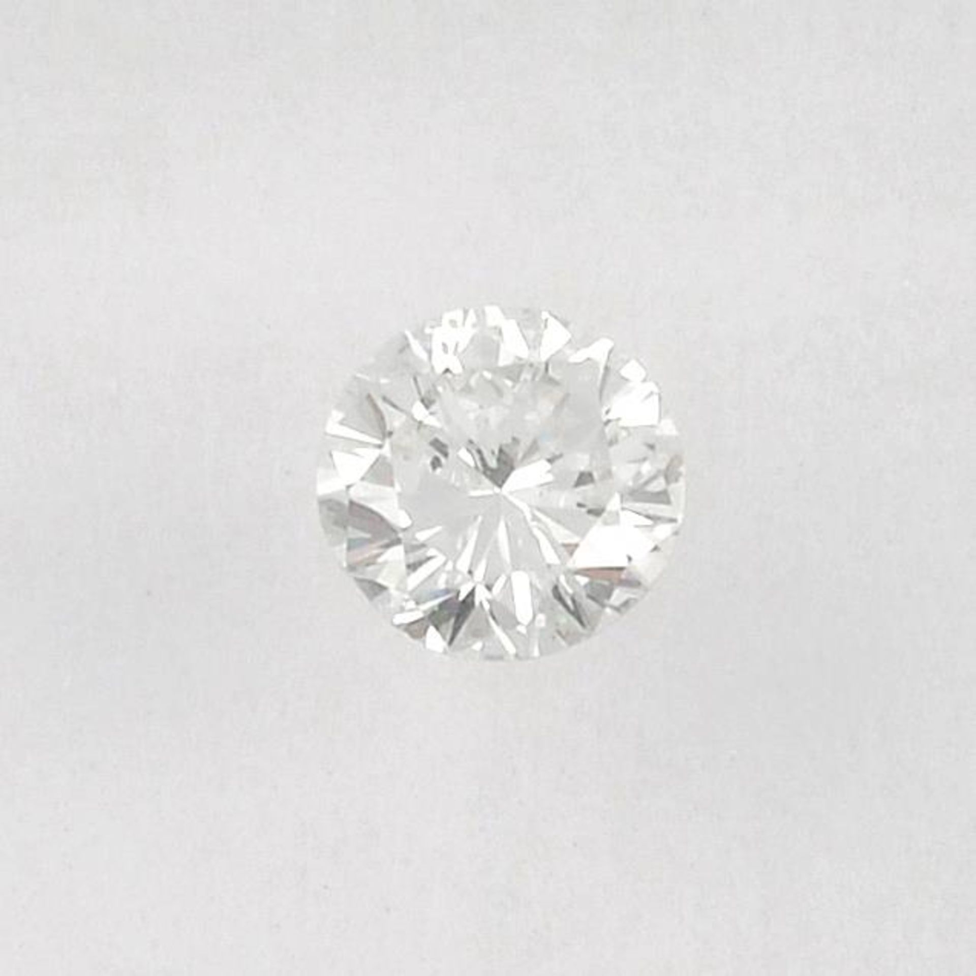 A brilliant cut diamond, weighing 0.31ct.