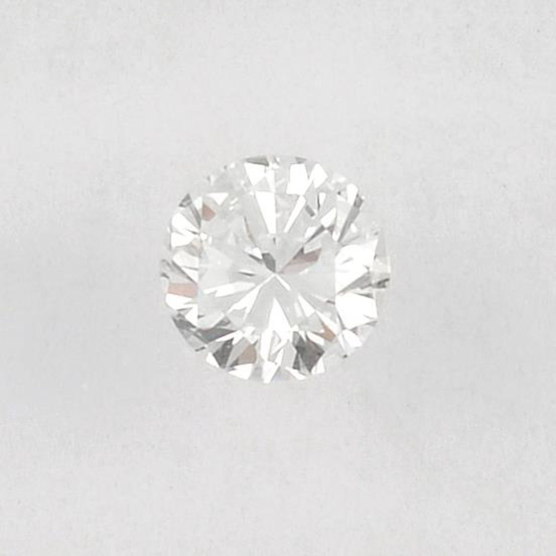 A brilliant cut diamond, weighing 0.39ct.