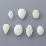 Seven vari-shape opals.