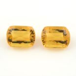 A pair of fancy shape citrines, weighing 35.81ct.