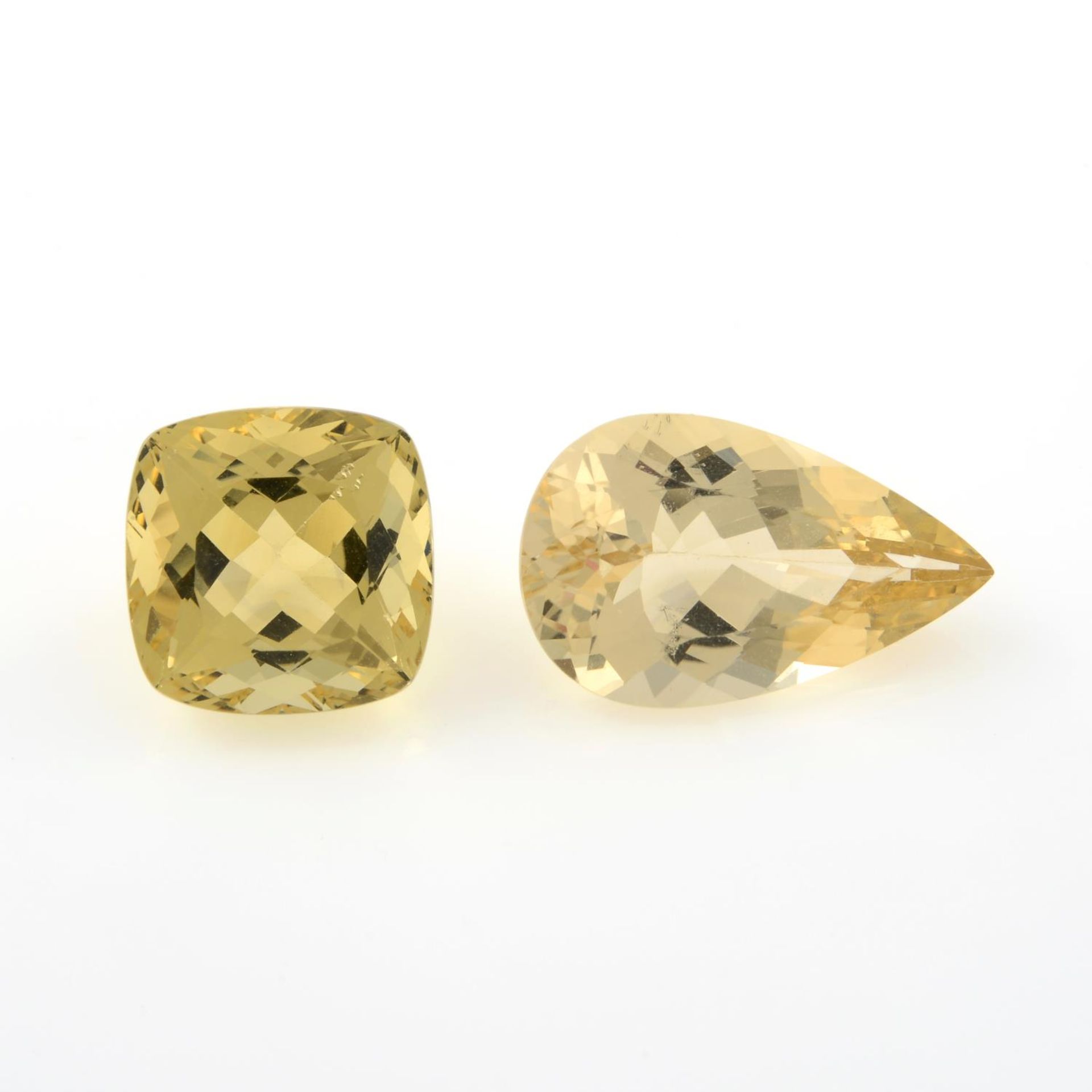 Two vari-shape yellow beryls.