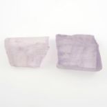 Two rough kunzite.