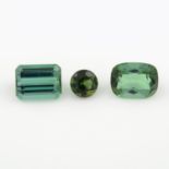 Three vari-shape green tourmalines.