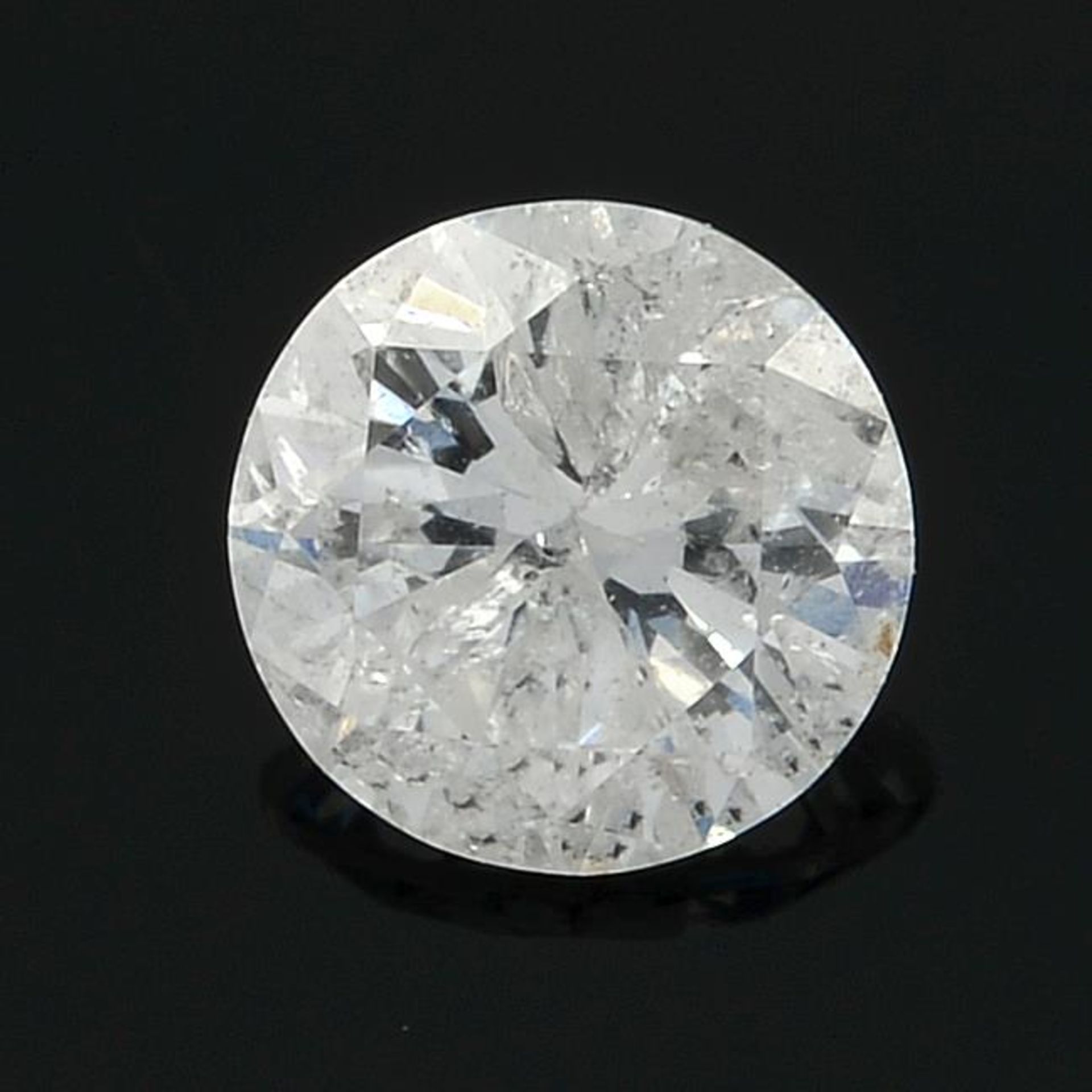 A brilliant-cut diamond, weighing 0.27ct.
