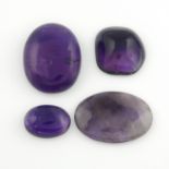 Four oval shape amethyst cabochons,