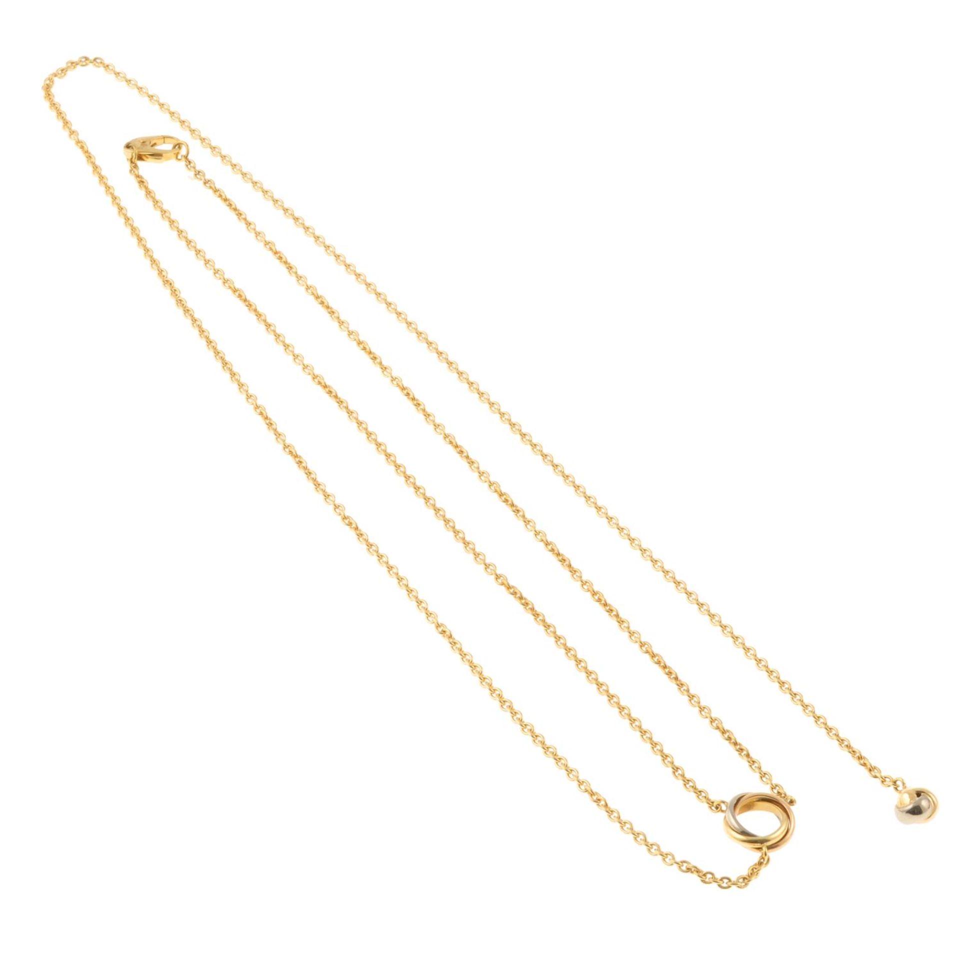 A 'Trinity' necklace, by Cartier.Signed Cartier DC4557.Stamped 750.Length 32cms. - Bild 3 aus 3