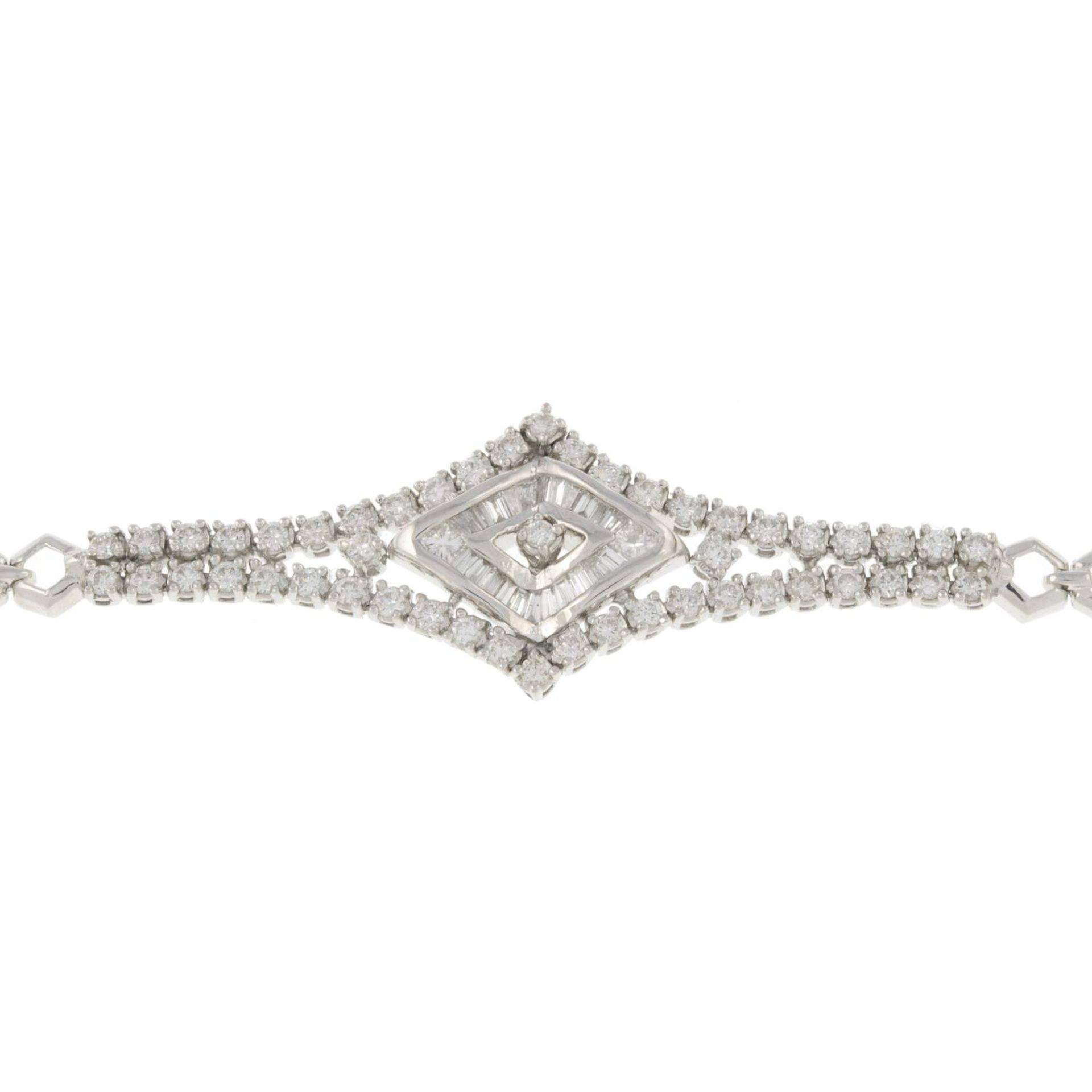 A vari-cut diamond bracelet.Estimated total diamond weight 2.25cts,